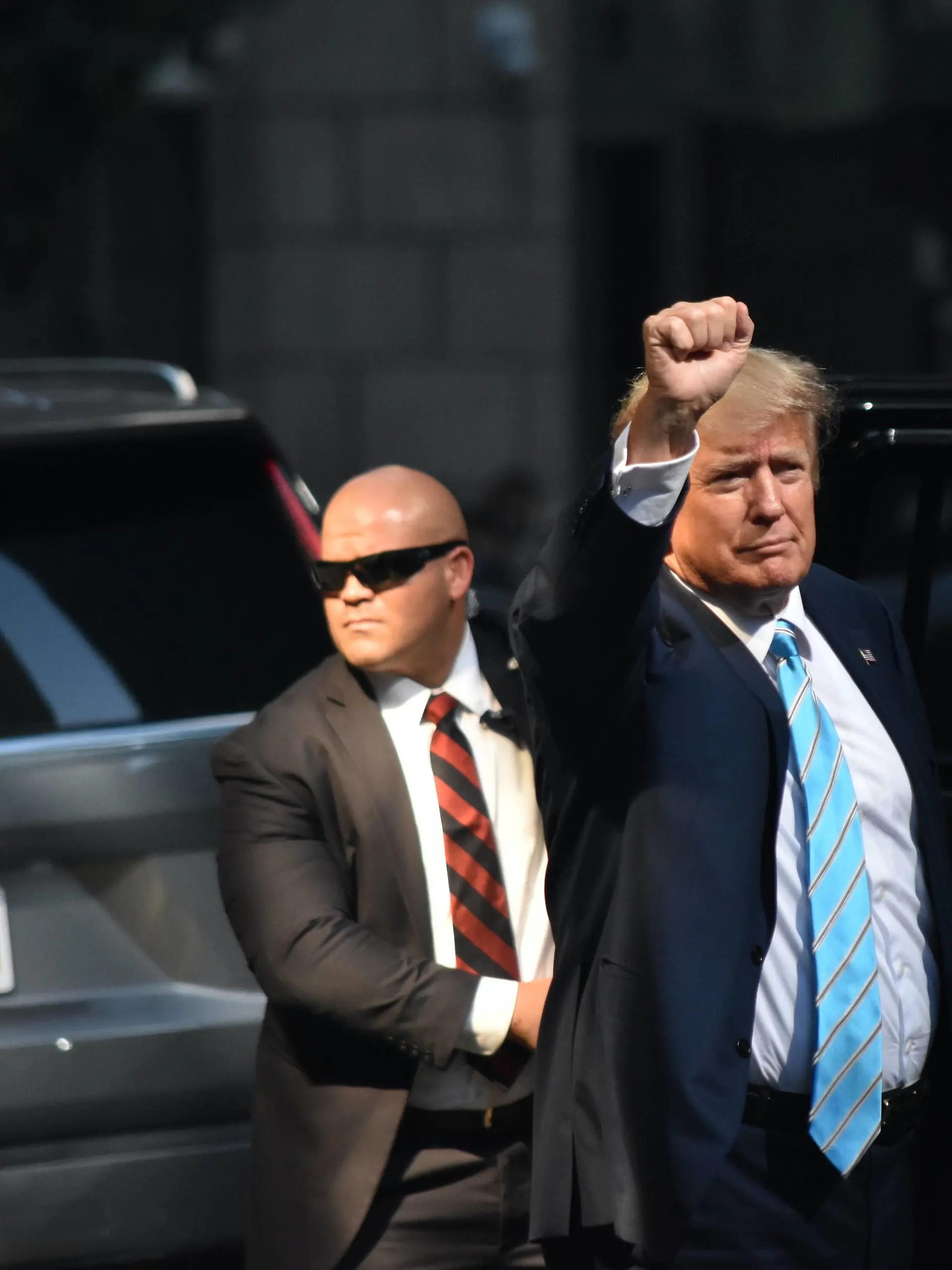 May 31, 2023, Manhattan, New York, United States: Former President of the United States Donald J. Trump throws his fist in the air to a crowd outside Trump Tower. Former President of the United States Donald J. Trump departed Trump Tower in Manhattan for a two day trip to Des Moines, Iowa. Former President of the United States Donald J. Trump waved to the crowd outside Trump Tower prior to his departure and threw his fist in the air to the crowd. Manhattan United States - ZUMAs197 20230531_zaa_s197_306 Copyright: xKylexMazzax