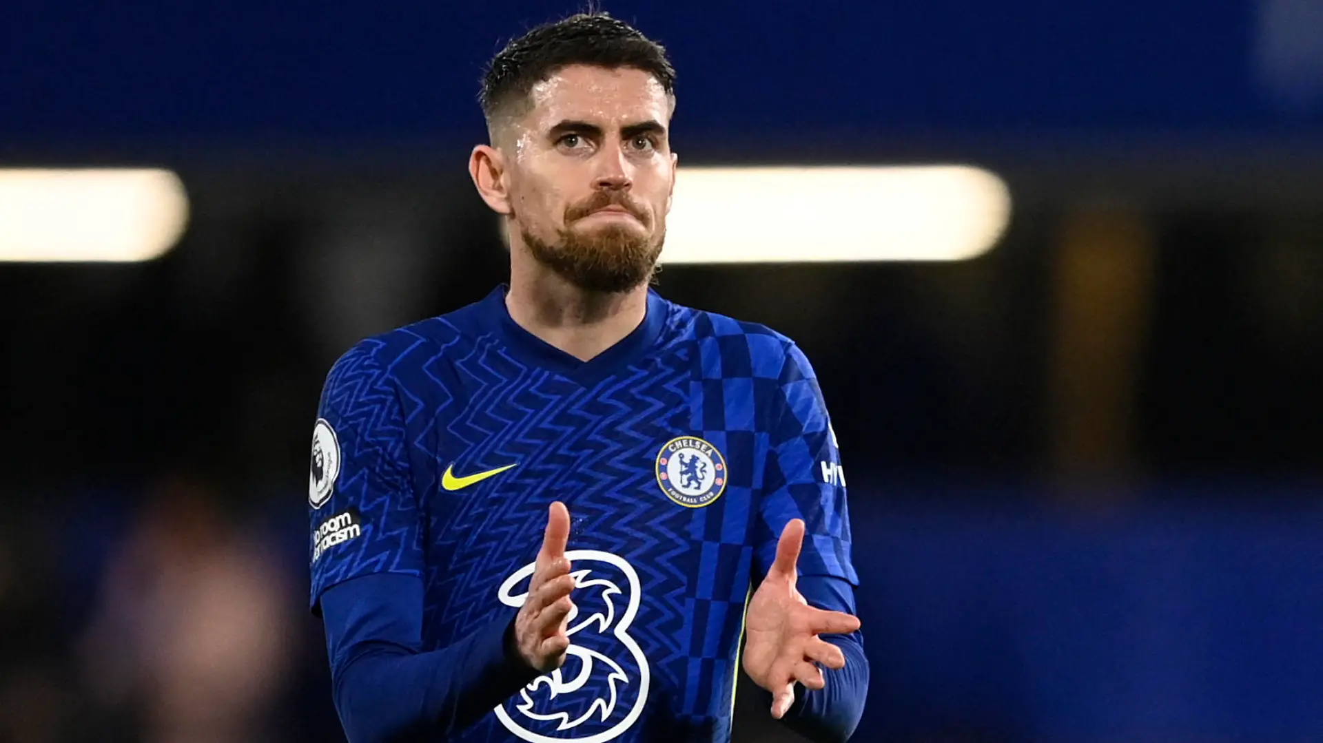 Soccer Football - Premier League - Chelsea v Brighton & Hove Albion - Stamford Bridge, London, Britain - December 29, 2021 Chelsea's Jorginho applauds fans after the match REUTERS/Tony Obrien EDITORIAL USE ONLY. No use with unauthorized audio, video, data, fixture lists, club/league logos or 'live' services. Online in-match use limited to 75 images, no video emulation. No use in betting, games or single club /league/player publications. Please contact your account representative for further details.