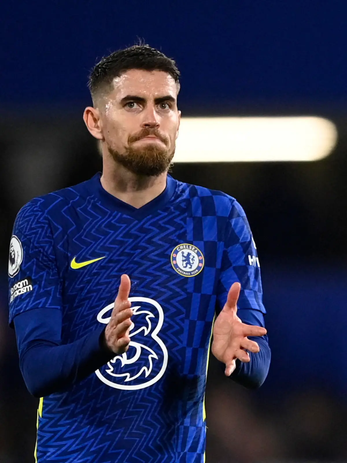 Soccer Football - Premier League - Chelsea v Brighton & Hove Albion - Stamford Bridge, London, Britain - December 29, 2021 Chelsea's Jorginho applauds fans after the match REUTERS/Tony Obrien EDITORIAL USE ONLY. No use with unauthorized audio, video, data, fixture lists, club/league logos or 'live' services. Online in-match use limited to 75 images, no video emulation. No use in betting, games or single club /league/player publications.  Please contact your account representative for further details.
