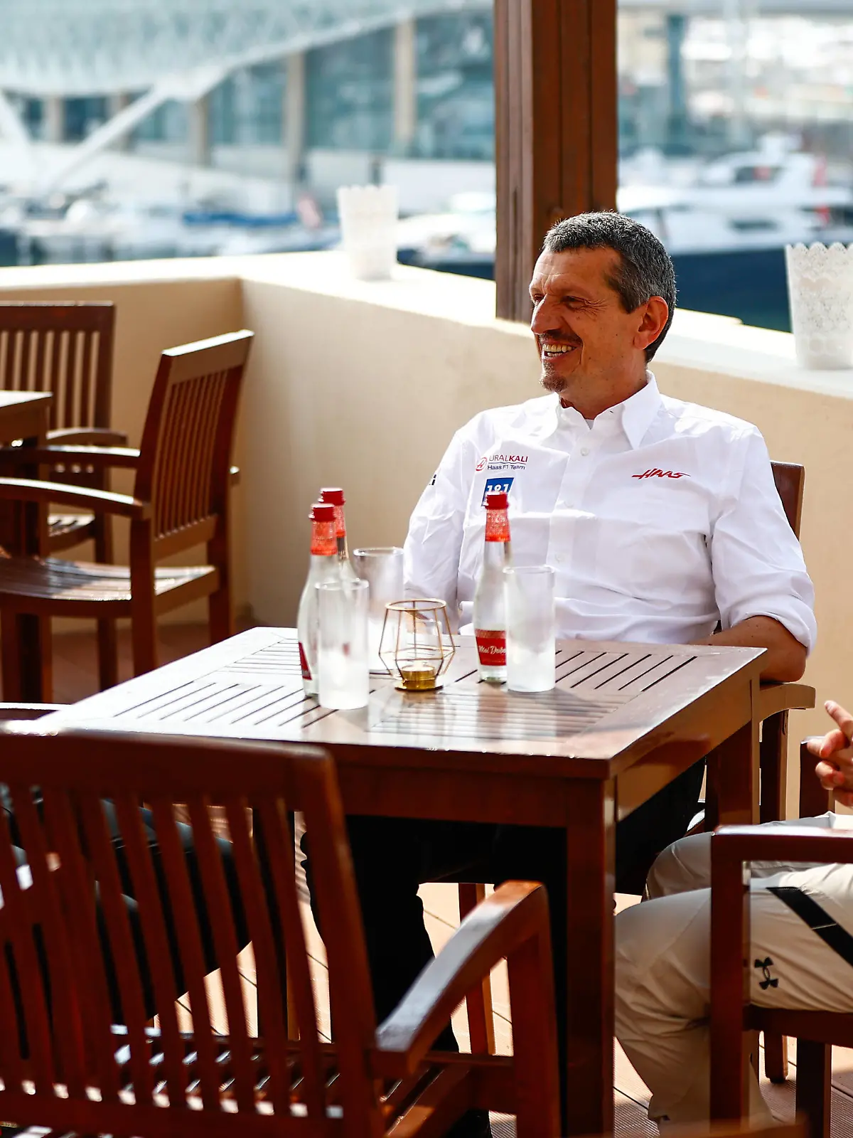 Formula 1 2021: Abu Dhabi GP YAS MARINA CIRCUIT, UNITED ARAB EMIRATES - DECEMBER 11: Guenther Steiner, Team Principal, Haas F1, Mick Schumacher, Haas F1, and Nikita Mazepin, Haas F1 during the Abu Dhabi GP at Yas Marina Circuit on Saturday December 11, 2021 in Abu Dhabi, United Arab Emirates. Photo by Andy Hone / LAT Images Images PUBLICATIONxINxGERxSUIxAUTxHUNxONLY GP2122_085248_ONZ1464 