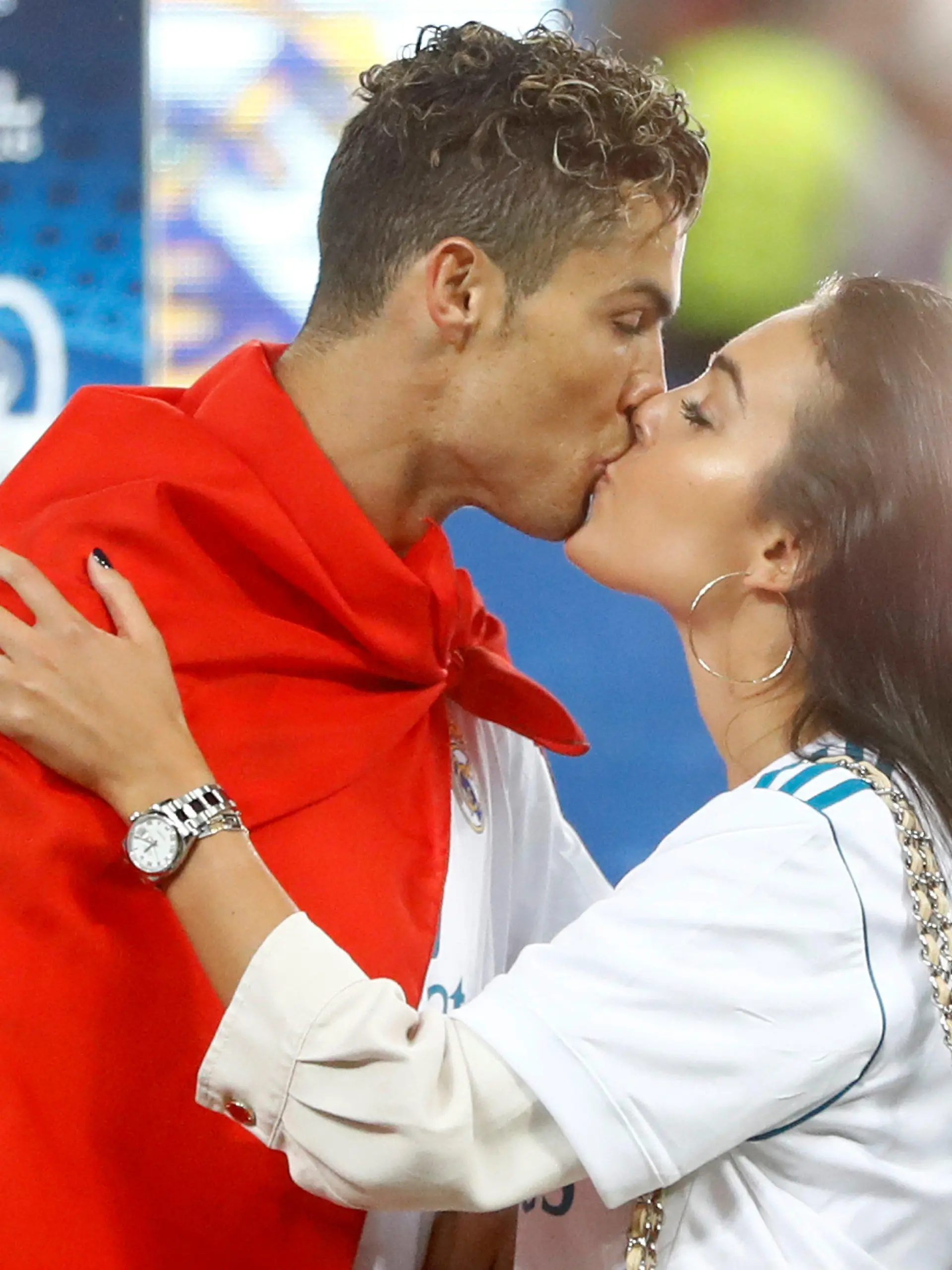 Soccer Football - Champions League Final - Real Madrid v Liverpool - NSC Olympic Stadium, Kiev, Ukraine - May 26, 2018   Real Madrid's Cristiano Ronaldo kisses his girlfriend Georgina Rodriguez as he celebrates winning the Champions League                               REUTERS/Kai Pfaffenbach