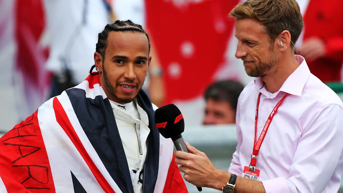 British Grand Prix - Race - Silverstone. Race winner Lewis Hamilton (GBR) Mercedes AMG F1 in parc ferme with Jenson Button (GBR) Sky Sports F1 Presenter. British Grand Prix, Sunday 14th July 2019. Silverstone, England. URN:44106996