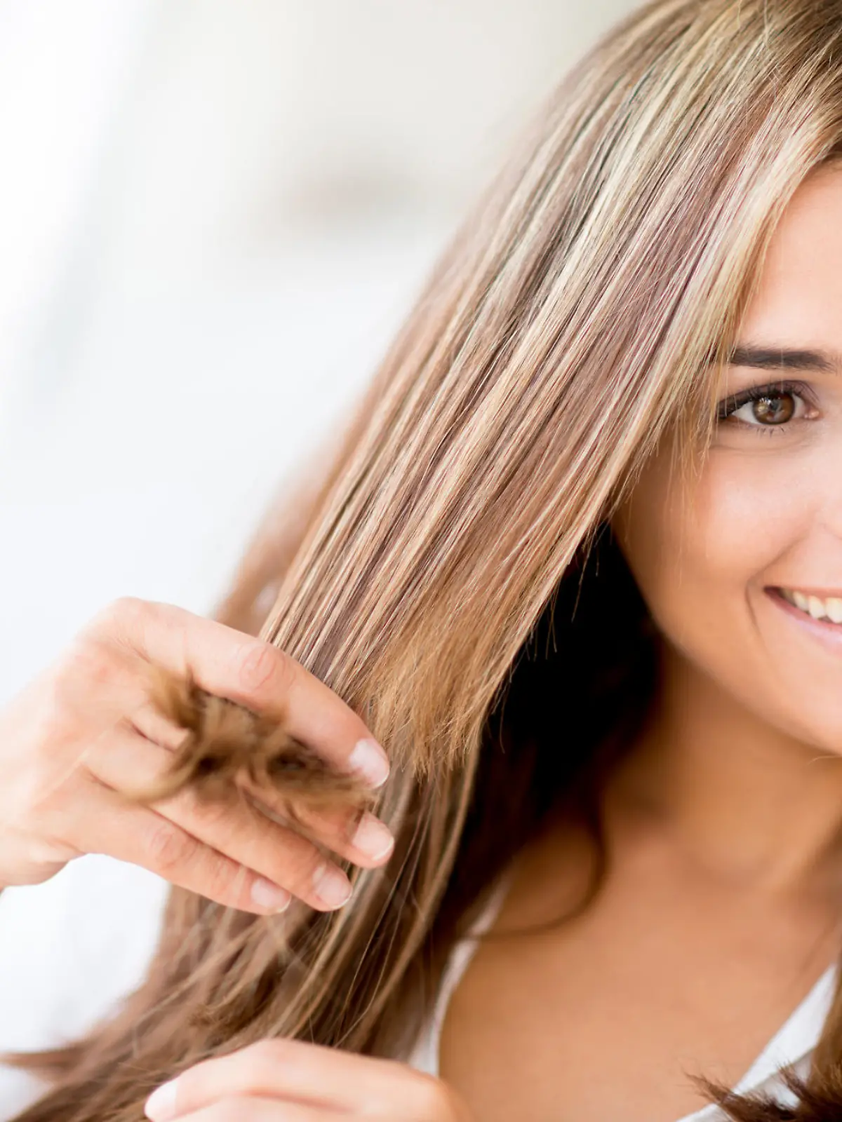 Woman at the hair salon loving her new hairstyle