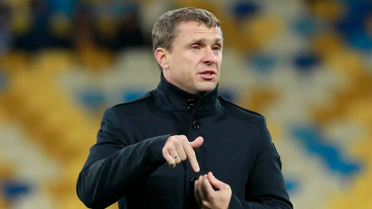 FILE - Kiev's headcoach Serhiy Rebrov talks prior to the Champions League round of sixteen first leg soccer match between Dynamo Kiev and Manchester City in Kiev, Ukraine, Wednesday, Feb. 24, 2016. Ukraine has appointed former Tottenham striker Serhiy Rebrov as coach of the men’s national soccer team as it aims to qualify for next year’s European Championship despite being unable to play at home because of the Russian invasion. (AP Photo/Sergei Chuzavkov, File)