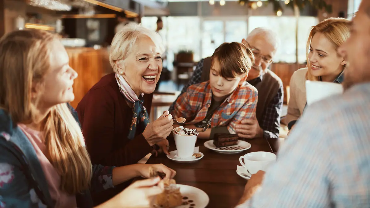 Close up of a happy family enjoying time together in a cafe