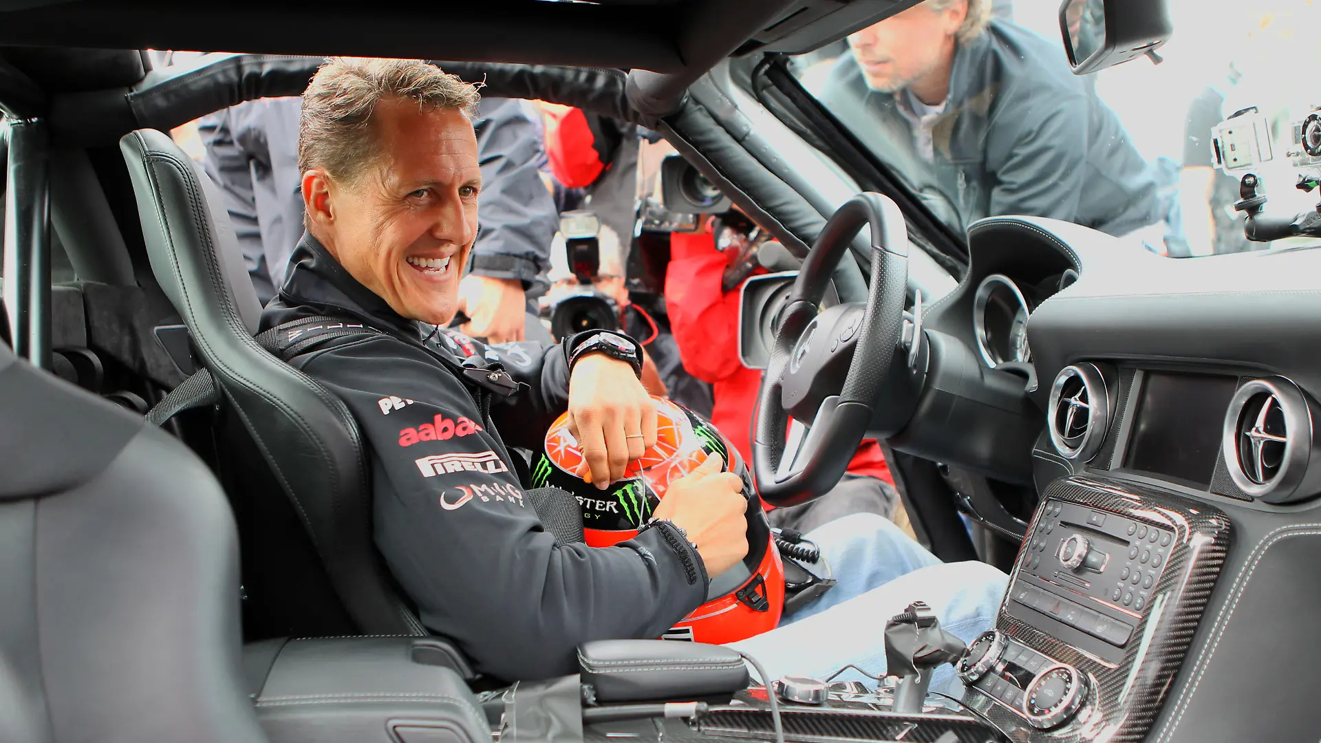 German Formula One driver Michael Schumacher of Mercedes GP sits in a Mercedes-Benz C63 AMG on the old race track "Nordschleife" at the F1 race track of Nuerburgring, Nuerburg, 21 July 2011. The Formula One Grand Prix of Germany will take place on 24 July. Photo: Jan Woitas dpa/lrs +++ dpa-Bildfunk +++