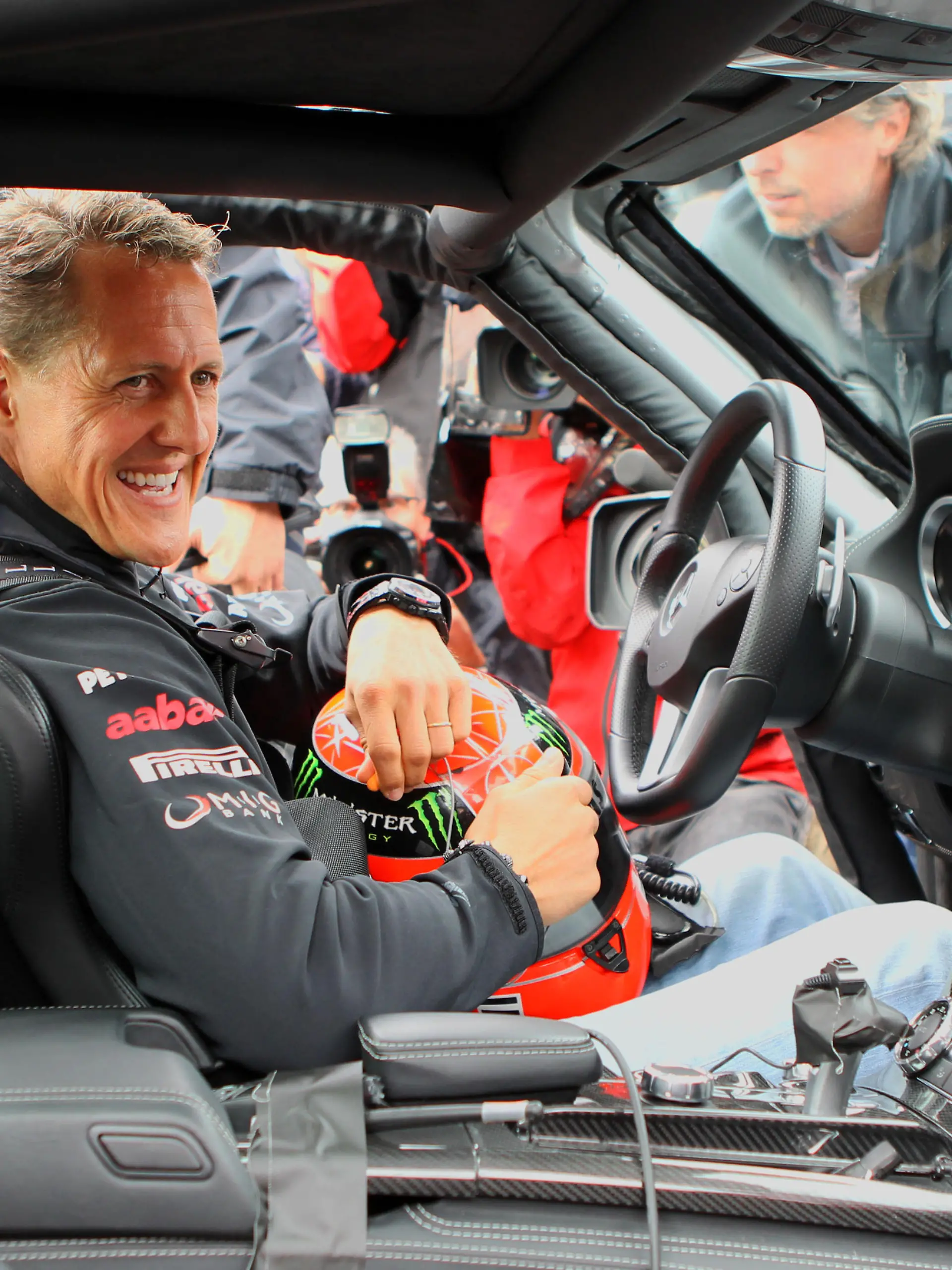 German Formula One driver Michael Schumacher of Mercedes GP sits in a Mercedes-Benz C63 AMG on the old race track "Nordschleife" at the F1 race track of Nuerburgring, Nuerburg, 21 July 2011. The Formula One Grand Prix of Germany will take place on 24 July. Photo: Jan Woitas dpa/lrs +++ dpa-Bildfunk +++