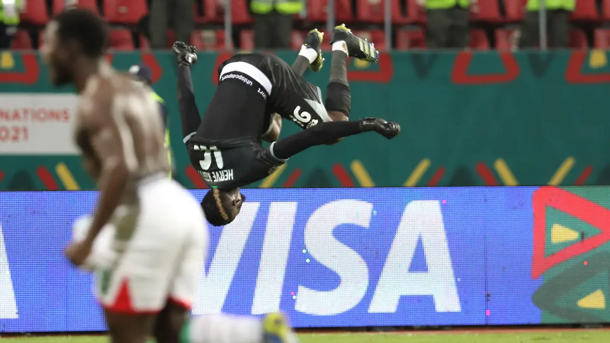 Football - 2021 Africa Cup of Nations - Finals - Last 16 - Gabon v Burkina Faso - Limbe - Cameroon. Burkina Faso goalkeeper Kouakou Herve Koffi celebrates victory during the 2021 Africa Cup of Nations Afcon Finals Last 16 match between Gabon and Burkina Faso in Limbe, Cameroon on 23 January 2022 ©Gavin Barker/Sports Inc URN:64911805