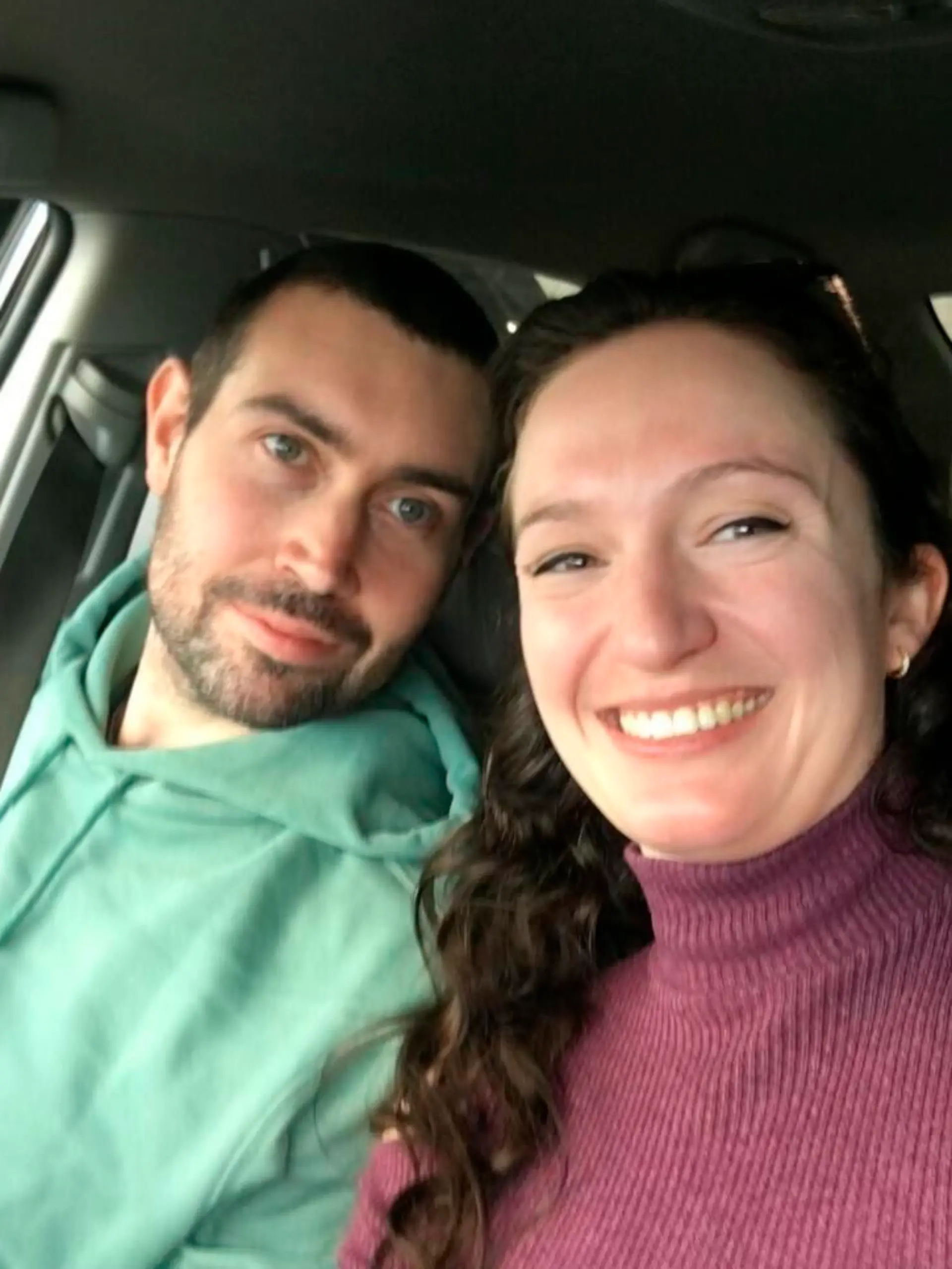 This undated photo provided by Brookhaven Police Dept. shows Matthew Willson, 31, of Chertsey, Surrey, England, with his girlfriend Katherine Shepard.   A stray bullet struck and killed Wilson, an English astrophysicist, while he was inside an Atlanta-area apartment on Sunday, Jan. 16, 2022. Police say the death was the result of “reckless” gunfire by random individuals. (Brookhaven Police Dept via AP)