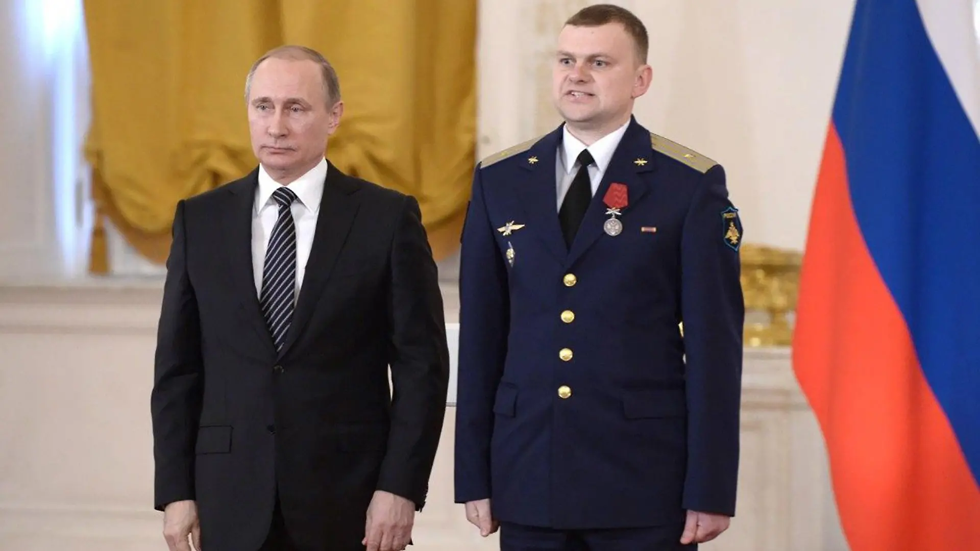 Girl, 7, daughter of decorated military pilot hero, was mauled to death by a pack of stray dogs on January 22, 2022 as she walked home from music school.
Major Anton Kanorsky with Vladimir Putin pictured during the award ceremony on 17.03.2016