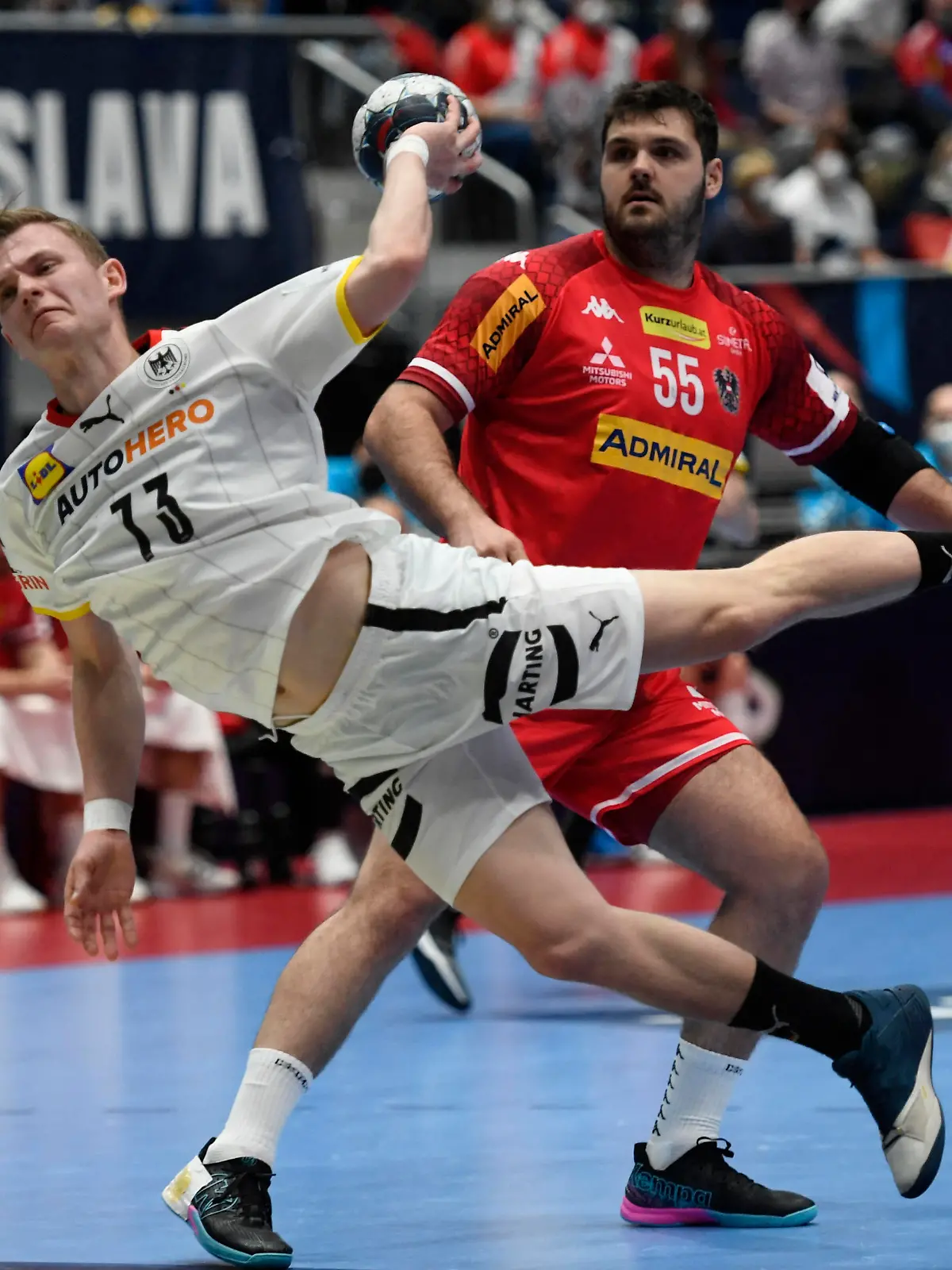 Handball - EHF 2022 Men's European Handball Championship - Group D - Germany v Austria - Ondrej Nepela Arena, Bratislava, Slovakia - January 16, 2022 Germany's Timo Kastening shoots at goal REUTERS/Radovan Stoklasa