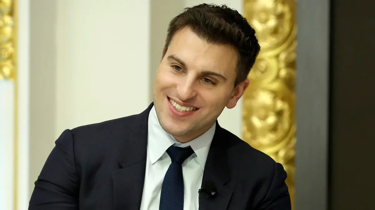 In this Monday, March 13, 2017, photo, Airbnb co-founder and CEO Brian Chesky is interviewed during a luncheon meeting of the Economic Club of New York. (AP Photo/Richard Drew)
