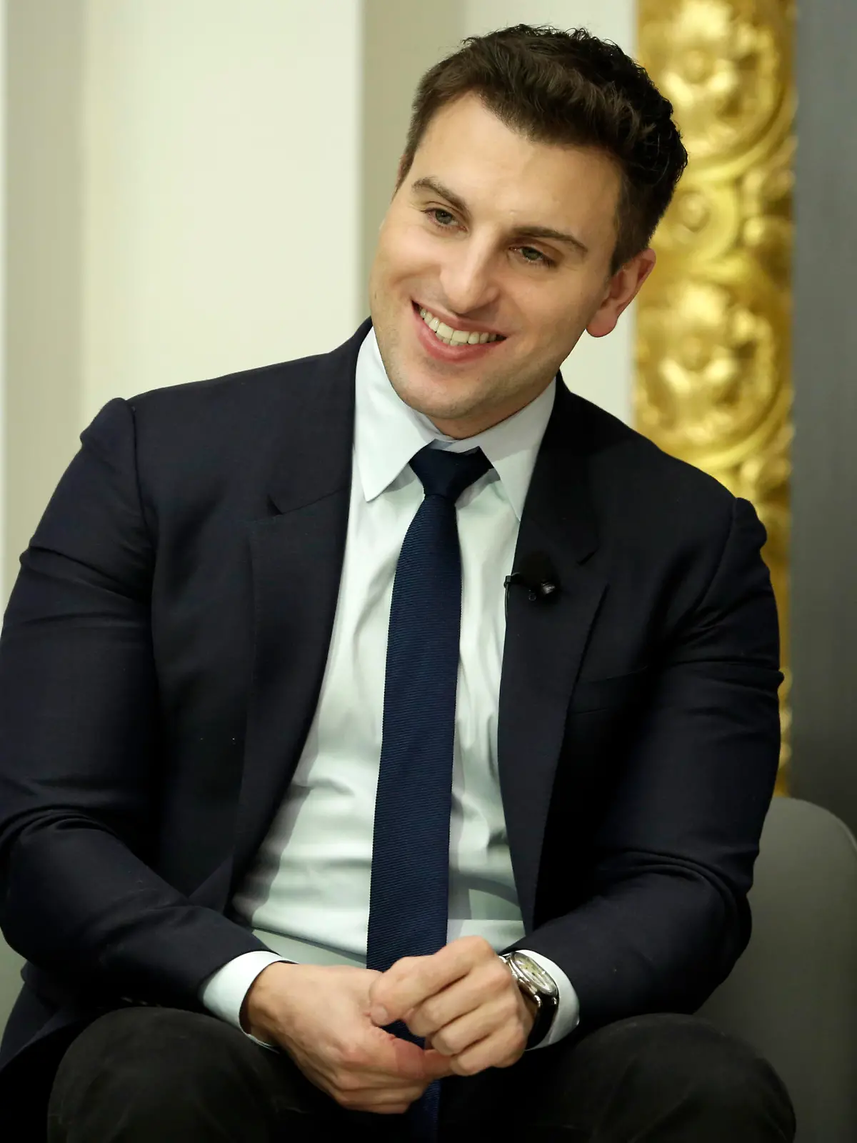 In this Monday, March 13, 2017, photo, Airbnb co-founder and CEO Brian Chesky is interviewed during a luncheon meeting of the Economic Club of New York. (AP Photo/Richard Drew)