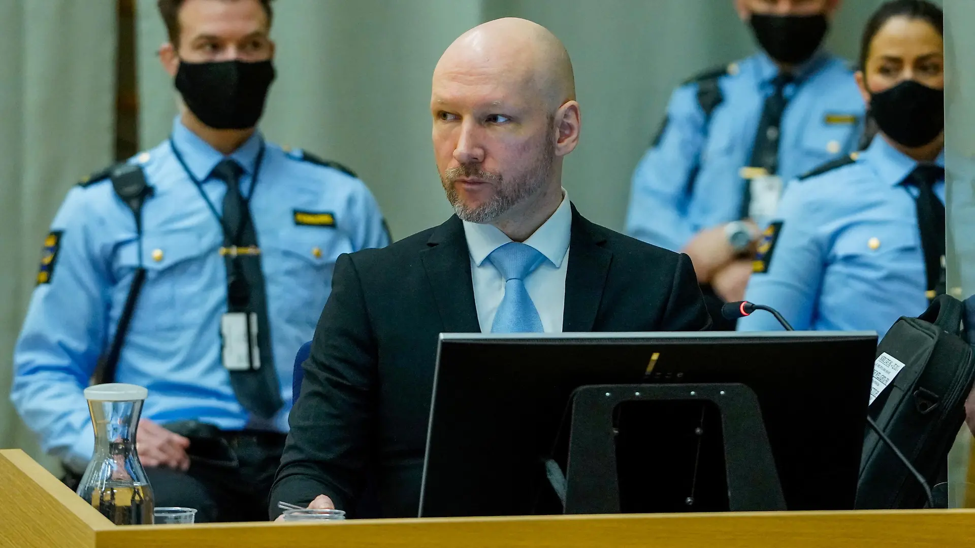 Mass killer Anders Behring Breivik, attends the second day of his trial, where he is requesting release on parole, at a makeshift courtroom in Skien prison, Skien, Norway January 19, 2022. Ole Berg-Rusten/NTB/via REUTERS ATTENTION EDITORS - THIS IMAGE WAS PROVIDED BY A THIRD PARTY. NORWAY OUT. NO COMMERCIAL OR EDITORIAL SALES IN NORWAY.
