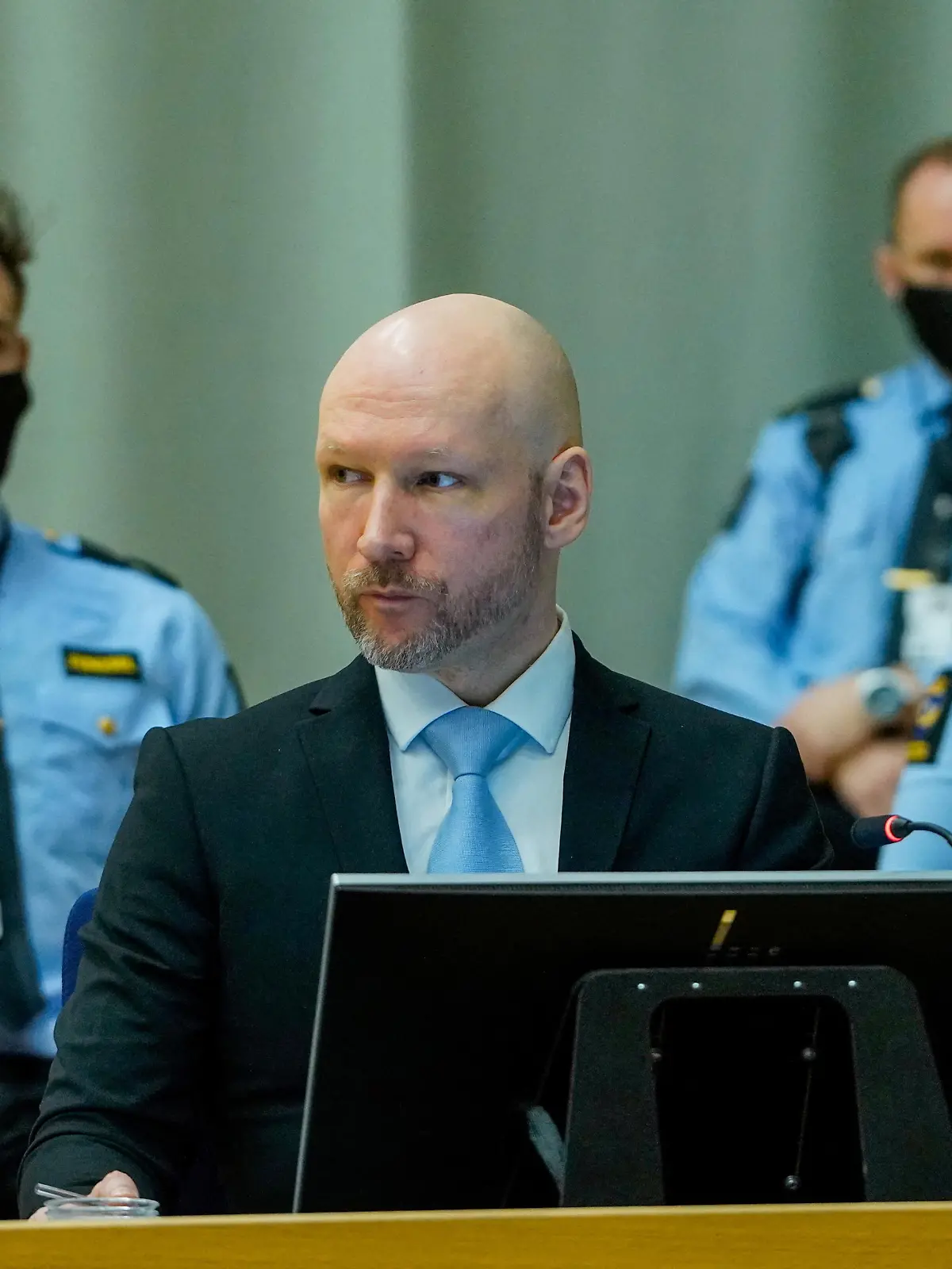 Mass killer Anders Behring Breivik, attends the second day of his trial, where he is requesting release on parole, at a makeshift courtroom in Skien prison, Skien, Norway January 19, 2022. Ole Berg-Rusten/NTB/via REUTERS   ATTENTION EDITORS - THIS IMAGE WAS PROVIDED BY A THIRD PARTY. NORWAY OUT. NO COMMERCIAL OR EDITORIAL SALES IN NORWAY.