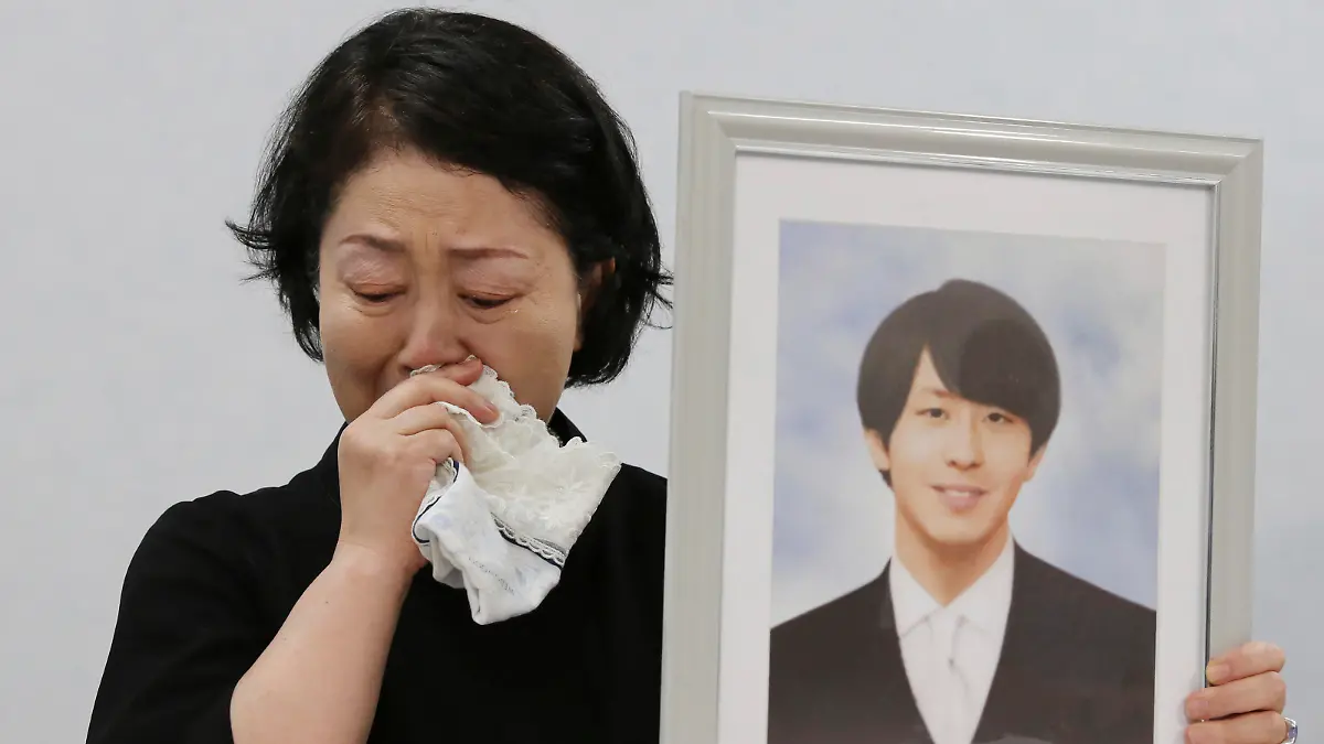 Junko Takashima, a mother of Shingo Takashima who is a male intern doctor at the Konan Medical Center and committed suicide in May last year, attends a press conference at Osaka District Court in Osaka City, Osaka Prefecture on August 18, 2023. The Labor Standards Inspection Office recognized that the cause was a mental disorder caused by working long hours. The intern doctor Shingo Takashima had no days off for about three months before his suicide, and had worked 207 hours of overtime per month, far exceeding the government's standard for recognition. Konan Medical Center Director Eisei Gu has denies that the center ordered him to work long hours.( The Yomiuri Shimbun via AP Images )