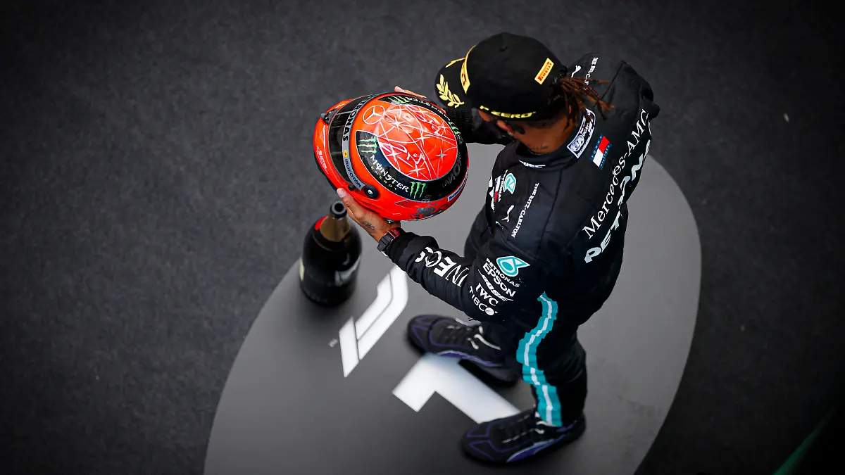  2020 Eifel GP NüRBURGRING, GERMANY - OCTOBER 11: Lewis Hamilton, Mercedes-AMG Petronas F1, 1st position, on the podium with the helmet of Michael Schumacher that was presented to him by Mick Schumacher upon equalling Michaels record number of 91 wins during the Eifel GP at Nürburgring on Sunday October 11, 2020, Germany. Photo by Zak Mauger / LAT Images Images PUBLICATIONxINxGERxSUIxAUTxHUNxONLY GP2010_140447_56I4271