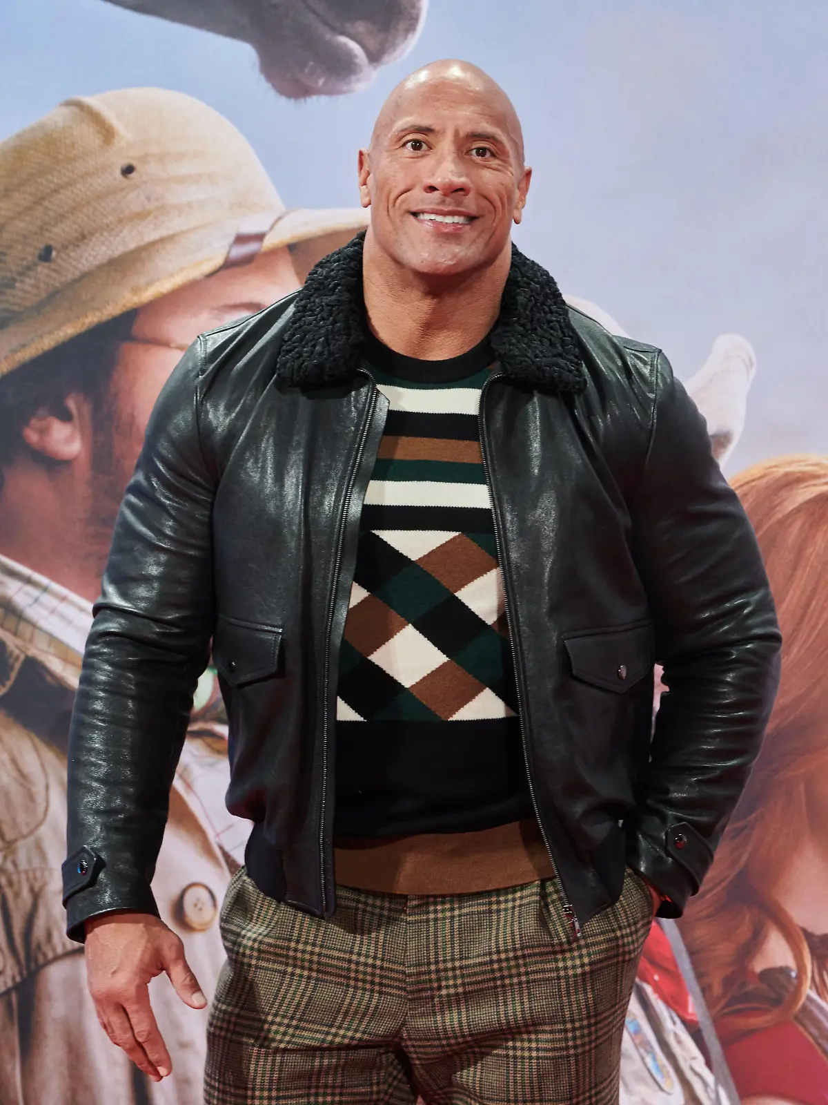ARCHIV - 04.12.2019, Berlin: Schauspieler Dwayne Johnson kommt zur Deutschlandpremiere des Films "Jumanji: The next Level". (zu dpa "«The Rock» will für Joe Biden und Kamala Harris stimmen") Foto: Annette Riedl/dpa +++ dpa-Bildfunk +++
