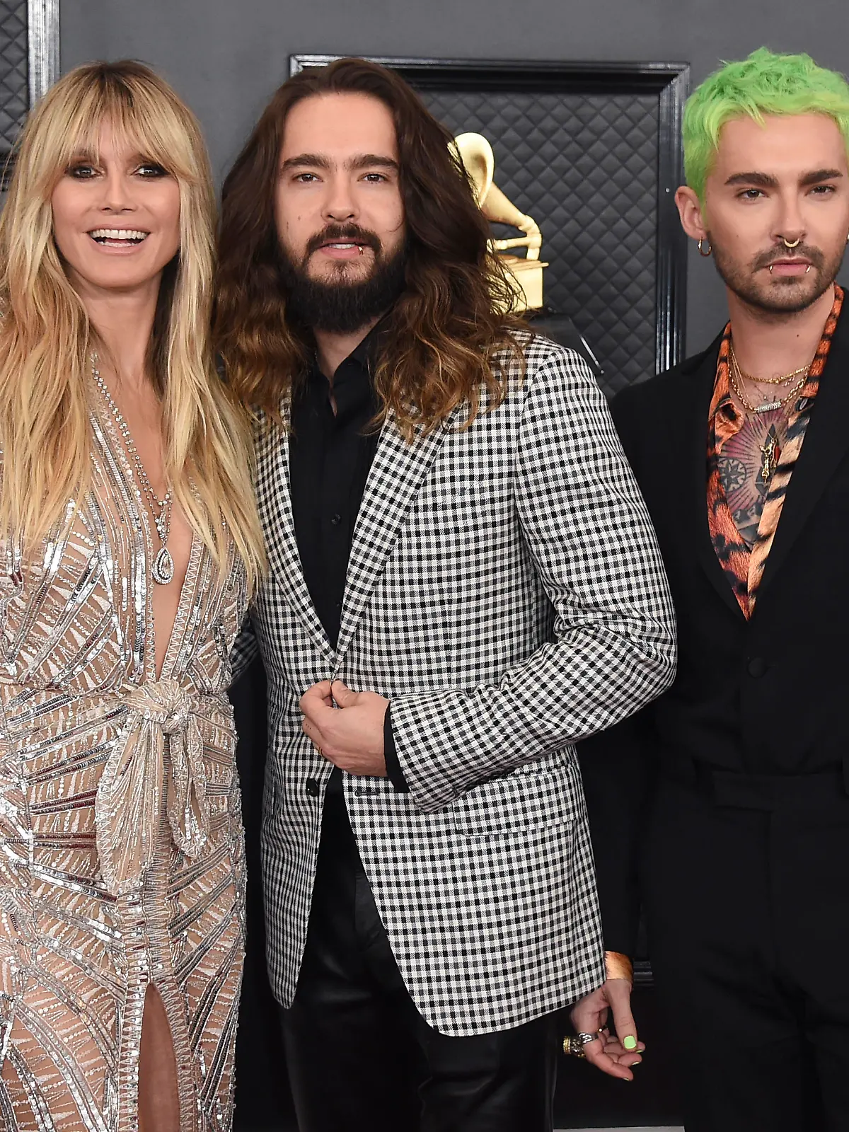 Heidi Klum, from left, Tom Kaulitz and Bill Kaulitz arrive at the 62nd annual Grammy Awards at the Staples Center on Sunday, Jan. 26, 2020, in Los Angeles. (Photo by Jordan Strauss/Invision/AP)