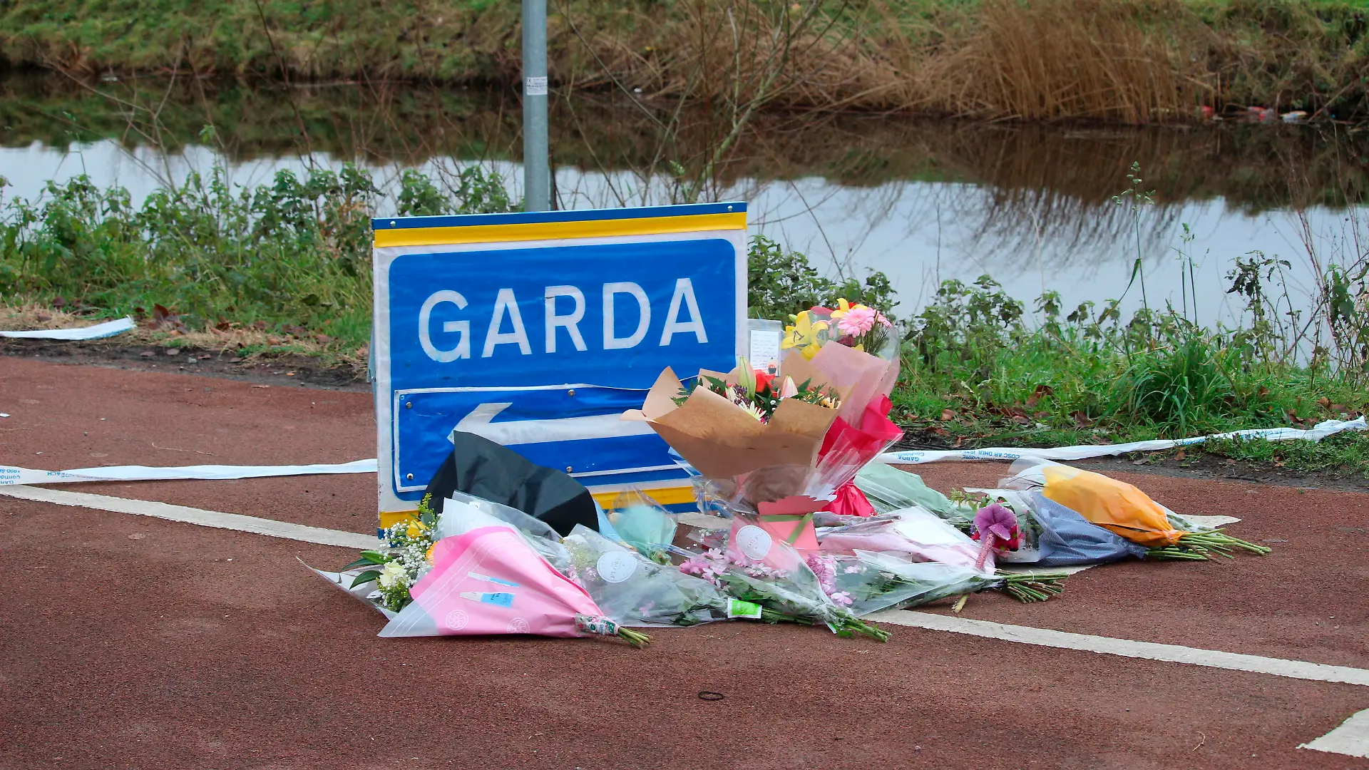 Ashling Murphy death. Flowers and messages left near to the scene in Tullamore, Co Offaly after a young woman, who has been named locally as Ashling Murphy, was killed on Wednesday evening. She died after being attacked while she was jogging along the canal bank at Cappincur at around 4pm on Wednesday. Issue date: Thursday January 13, 2022. See PA story IRISH Death. Photo credit should read: Dominic McGrath/PA Wire URN:64714025
