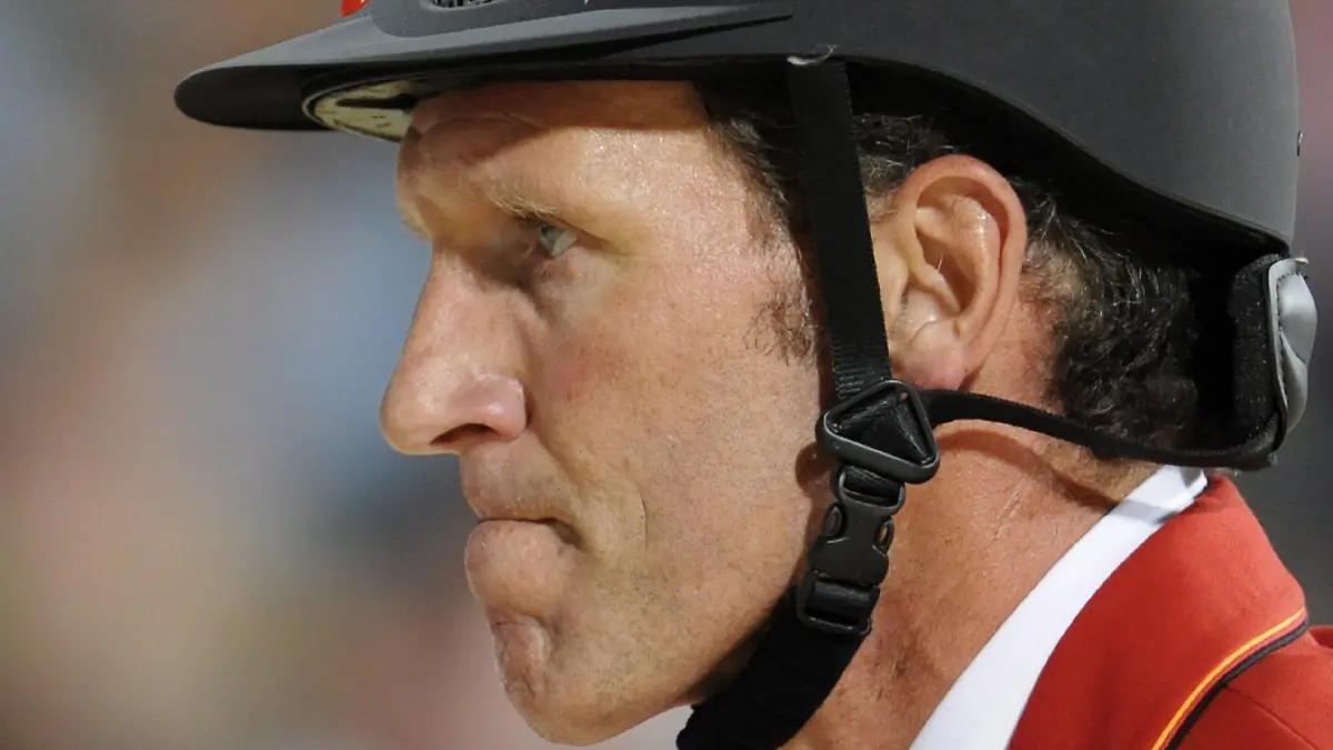 German show jumper Ludger Beerbaum reacts after competing with his horse All Inclusive in the 2nd qualifier of the jumping team event at the Equestrian Venue of the Beijing Olympic Games 2008 in Hong Kong, China 17 August 2008. EPA/JOCHEN LUEBKE +++(c) dpa - Bildfunk+++