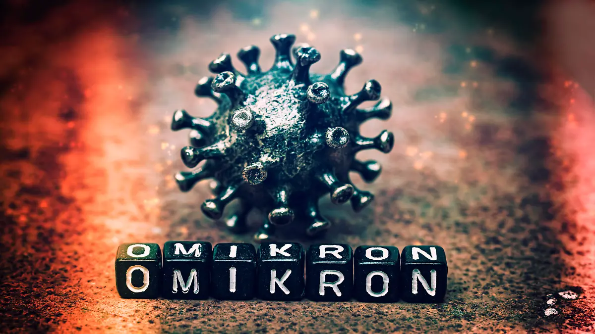 FOTOMONTAGE, Coronavirus mit Schriftzug Omikron, Symbolfoto Omikron-Variante B.1.1.529 *** PHOTOMONTAGE, coronavirus with writing Omikron, symbol photo Omikron variant B 1 1 529 