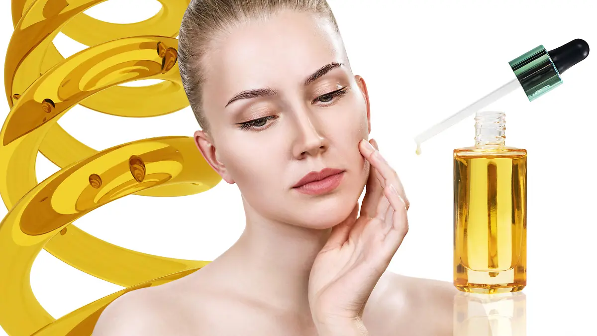 Cosmetic oil applying on young woman face with pipette. Beauty therapy concept.