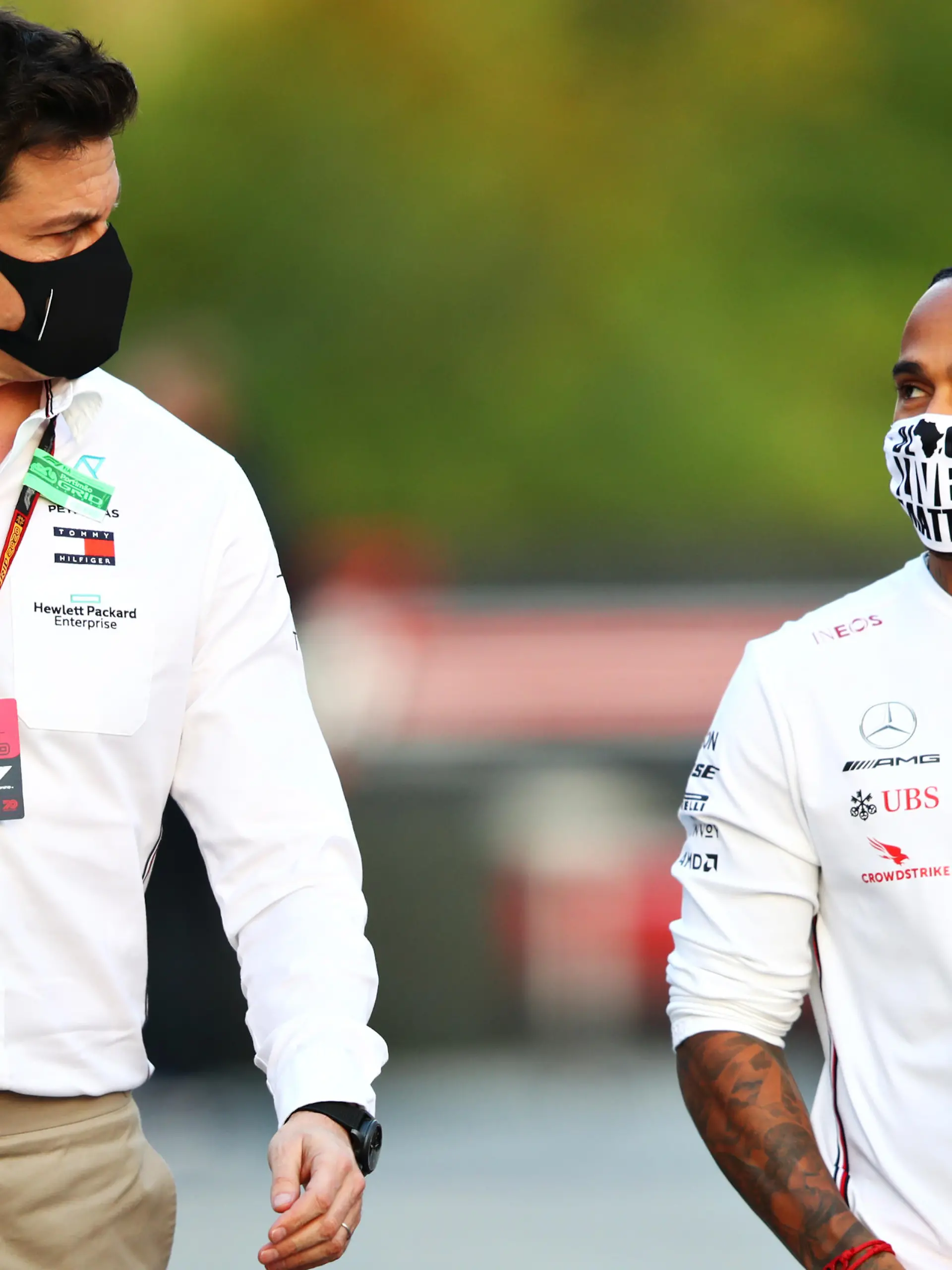 IMOLA, ITALY - OCTOBER 30: Lewis Hamilton of Great Britain and Mercedes GP and Mercedes GP Executive Director Toto Wolff walk in the Paddock during previews ahead of the F1 Grand Prix of Emilia Romagna at Autodromo Enzo e Dino Ferrari on October 30, 2020 in Imola, Italy. (Photo by Mark Thompson/Getty Images)