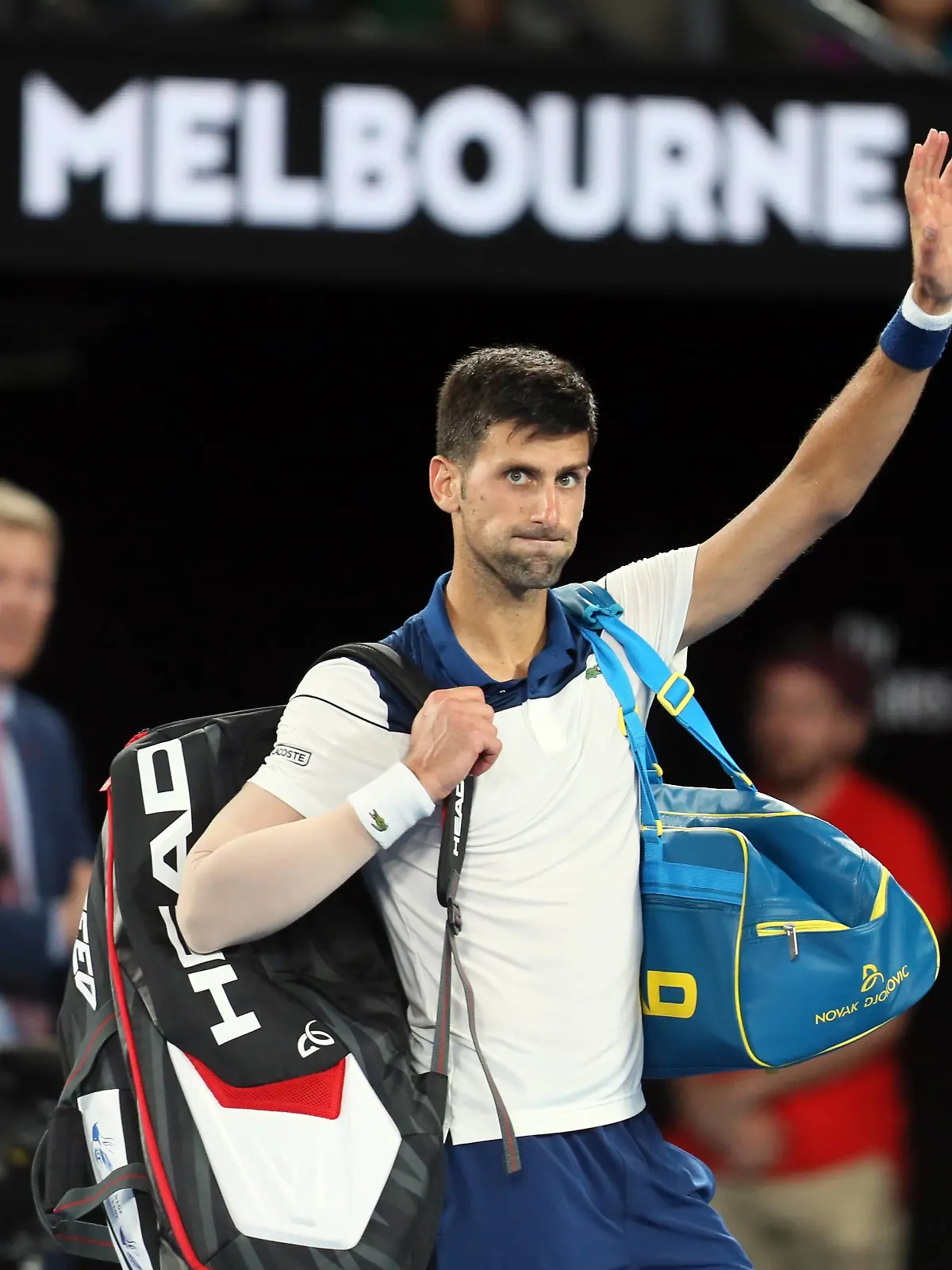 Bilder des Tages - SPORT (180122) -- MELBOURNE, Jan. 22, 2018 -- Novak Djokovic of Serbia left the court after the men s singles fourth round match against Chung Hyeon of South Korea at Australian Open 2018 in Melbourne, Australia, Jan. 22, 2018. Djokovic lost by 0-3. ) (SP)AUSTRALIA-MELBOURNE-TENNIS-AUSTRALIAN OPEN-DAY 8 LixPeng PUBLICATIONxNOTxINxCHN  