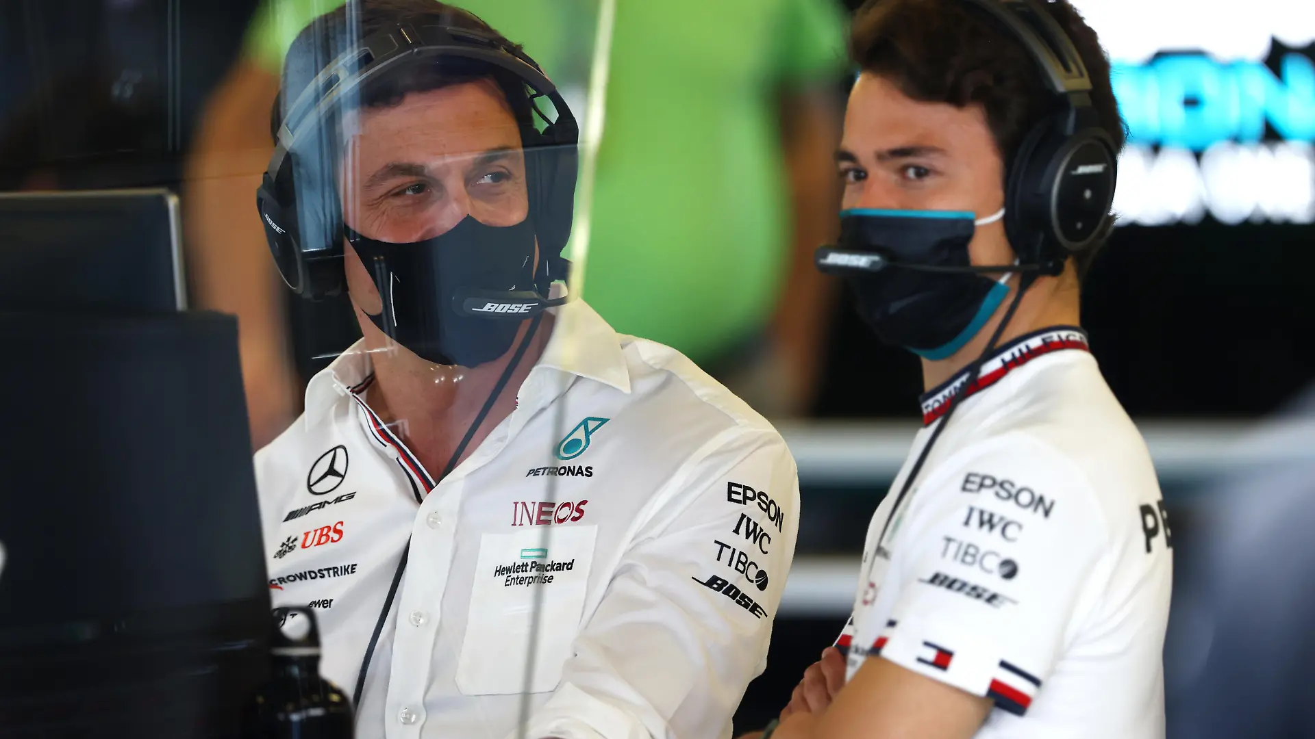 ABU DHABI, UNITED ARAB EMIRATES - DECEMBER 10: Mercedes GP Executive Director Toto Wolff and Nyck de Vries of Netherlands and Mercedes GP talk in the garage during practice ahead of the F1 Grand Prix of Abu Dhabi at Yas Marina Circuit on December 10, 2021 in Abu Dhabi, United Arab Emirates. (Photo by Clive Rose/Getty Images)