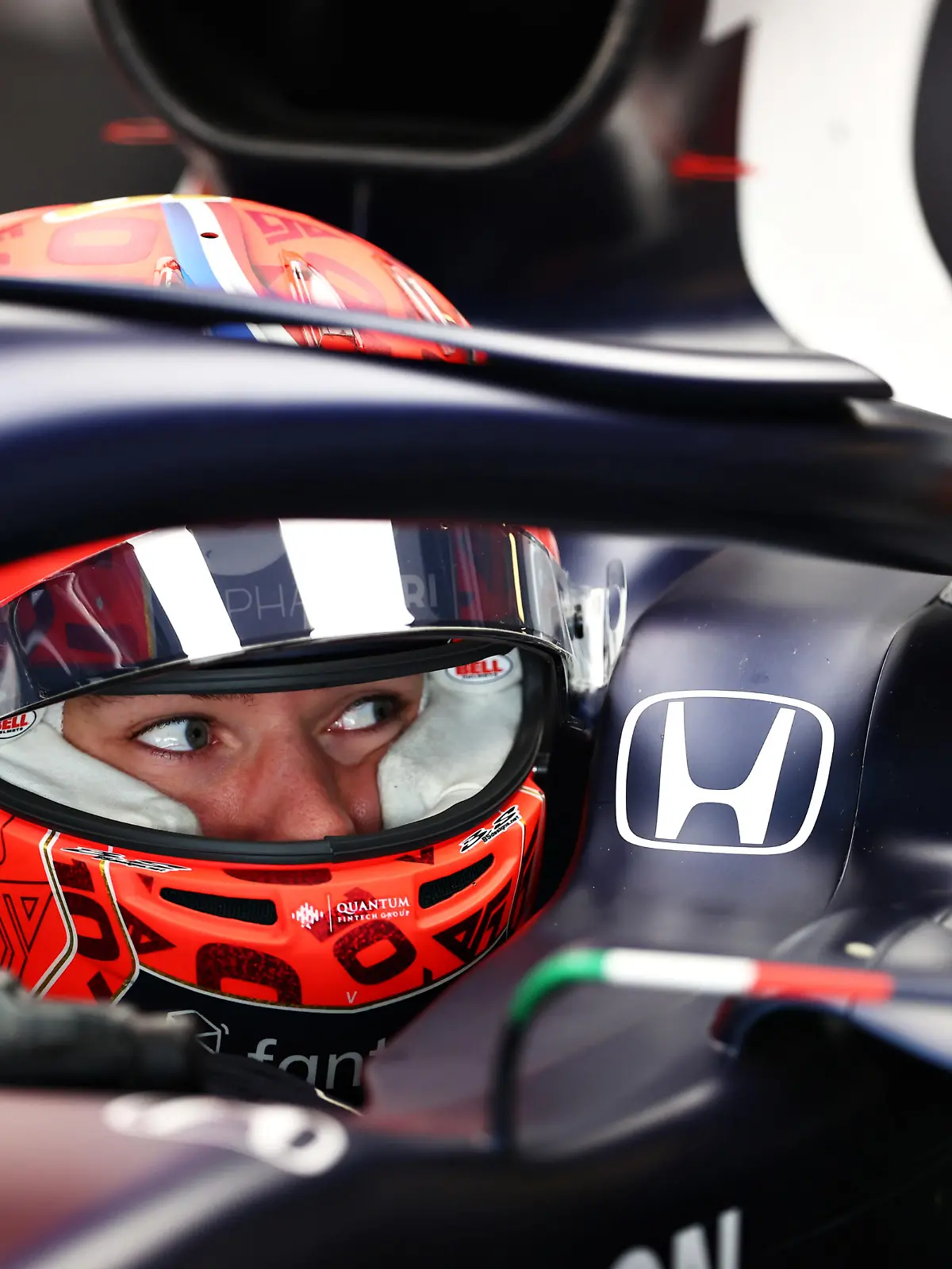 ABU DHABI, UNITED ARAB EMIRATES - DECEMBER 15: Pierre Gasly of France and Scuderia AlphaTauri prepares to drive in the garage during Formula 1 testing at Yas Marina Circuit on December 15, 2021 in Abu Dhabi, United Arab Emirates. (Photo by Clive Rose/Getty Images)