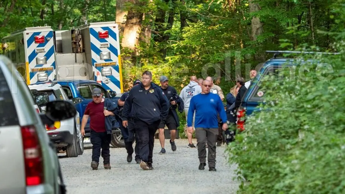 Search and rescue teams leave the command post at St. Mary's Wilderness en route to the Blue Ridge Parkway to search for the site where a Cessna Citation crashed over mountainous terrain near Montebello, Va., Sunday, June 4, 2023. (Randall K. Wolf via AP)