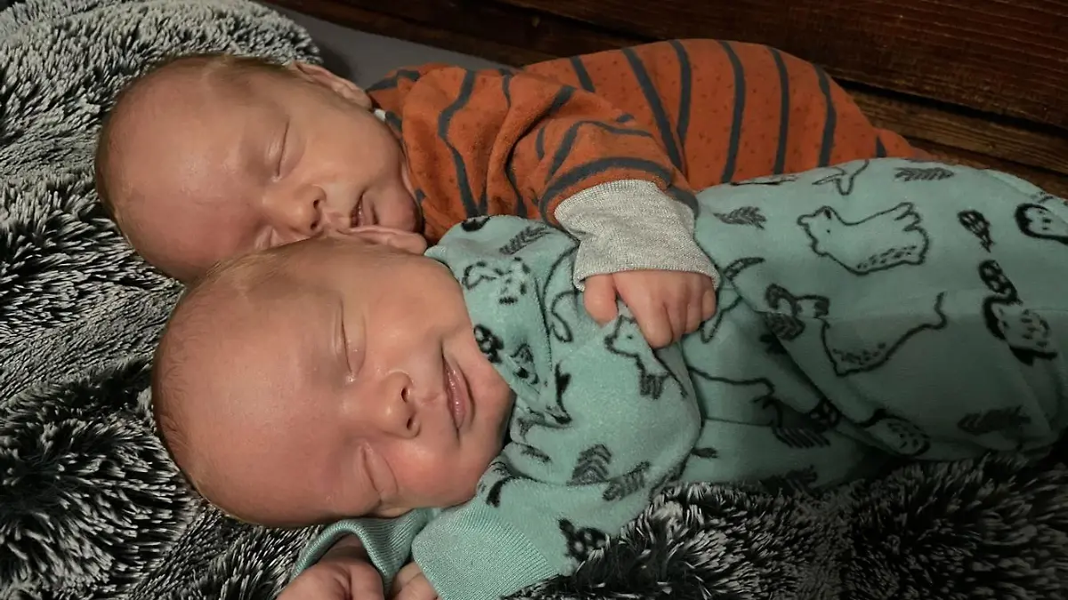 @momtothegrundtwins / CATERS NEWS (PICTURED Brenna Grund's inseparable twins) These twin babies show their incredible bond as they refuse to sleep in separate beds. Brenna Grund, 27, says her twins find each other's presence soothing and comforting and have only spent one night apart since they were born. After receiving some criticism on TikTok for letting them sleep beside one another, she decided to show what happens when she tries to separate her seven-month-old twins at home in Minnesota, US. Brenna said: "My heart broke separating them so I took them out after a few minutes of not calming down and put them in bed next to each other and they fell asleep within two minutes. SEE CATERS COPY