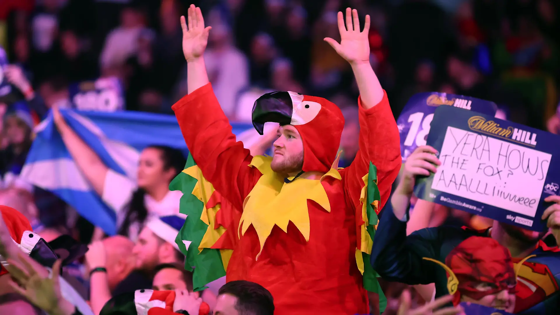 3rd January 2022: Alexandra Palace, London, England: The William Hill World Darts Tournament final between Peter Wright and Michael Smith; Dart fans are seen in fancy dress during the PDC world final