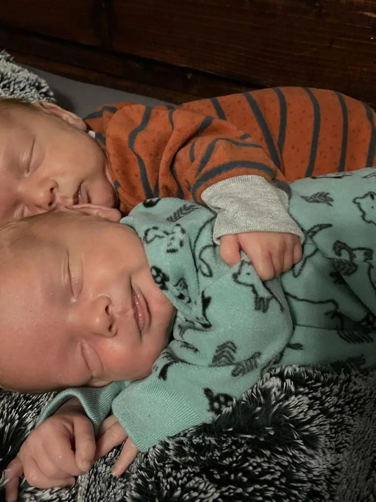 @momtothegrundtwins / CATERS NEWS (PICTURED Brenna Grund's inseparable twins) These twin babies show their incredible bond as they refuse to sleep in separate beds. Brenna Grund, 27, says her twins find each other's presence soothing and comforting and have only spent one night apart since they were born. After receiving some criticism on TikTok for letting them sleep beside one another, she decided to show what happens when she tries to separate her seven-month-old twins at home in Minnesota, US. Brenna said: "My heart broke separating them so I took them out after a few minutes of not calming down and put them in bed next to each other and they fell asleep within two minutes. SEE CATERS COPY