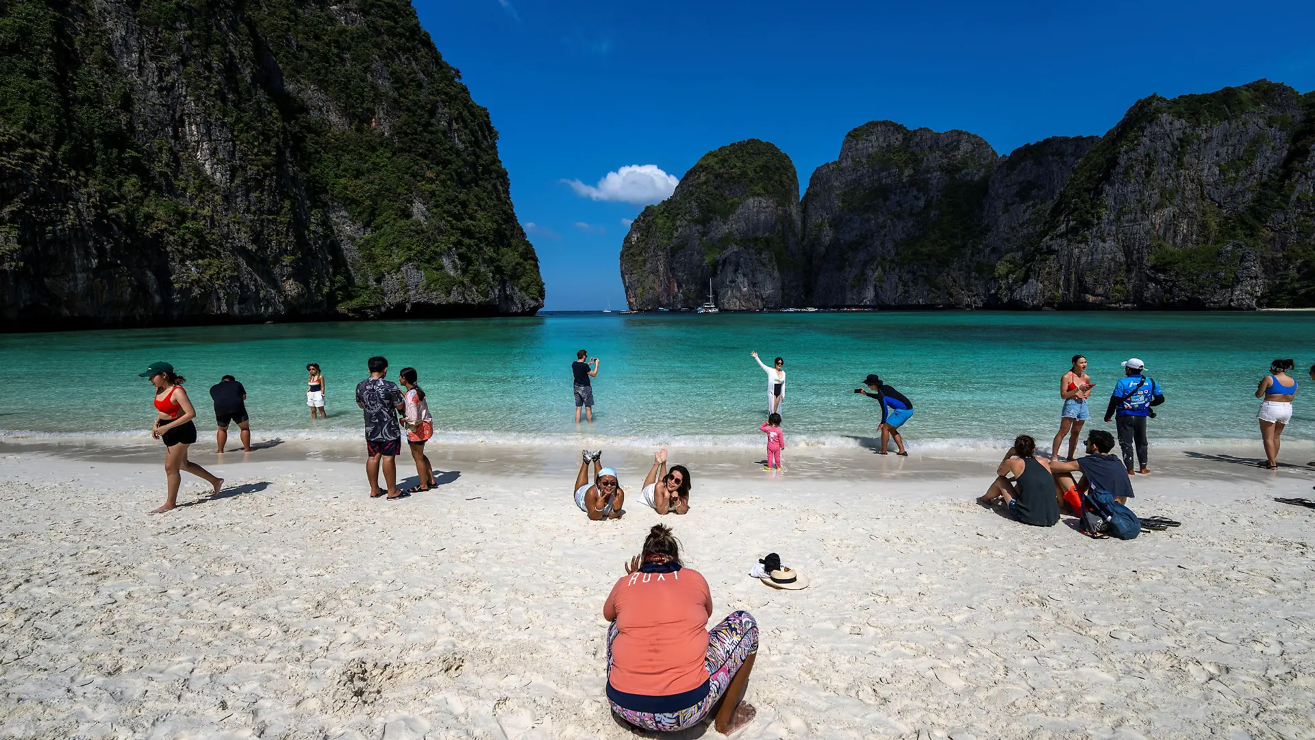 Tourists visit Maya bay after Thailand reopened its world-famous beach after closing it for more than three years to allow its ecosystem to recover from the impact of overtourism, at Krabi province, Thailand, January 3, 2022. Picture taken January 3, 2022. REUTERS/Athit Perawongmetha