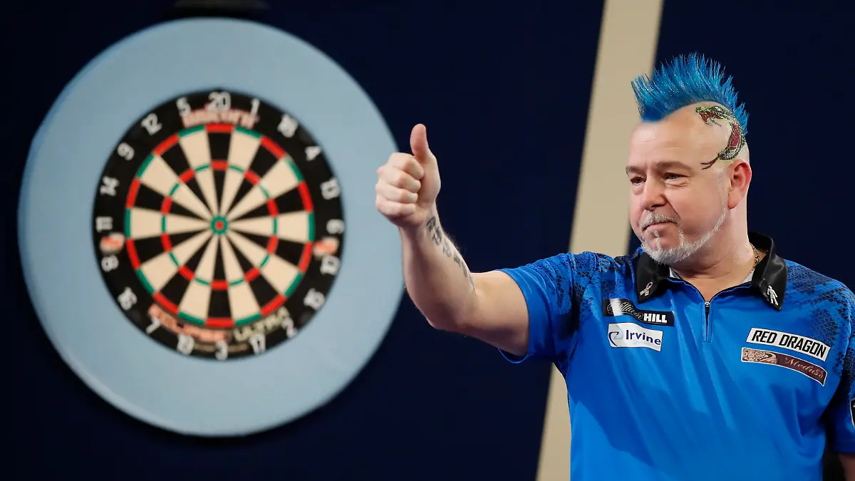 LONDON, ENGLAND - JANUARY 02: Peter Wright of Scotland reacts to the win during his Semi-Finals Match against Gary Anderson of Scotland during Day Fifteen of The William Hill World Darts Championship at Alexandra Palace on January 02, 2022 in London, England. (Photo by Luke Walker/Getty Images)