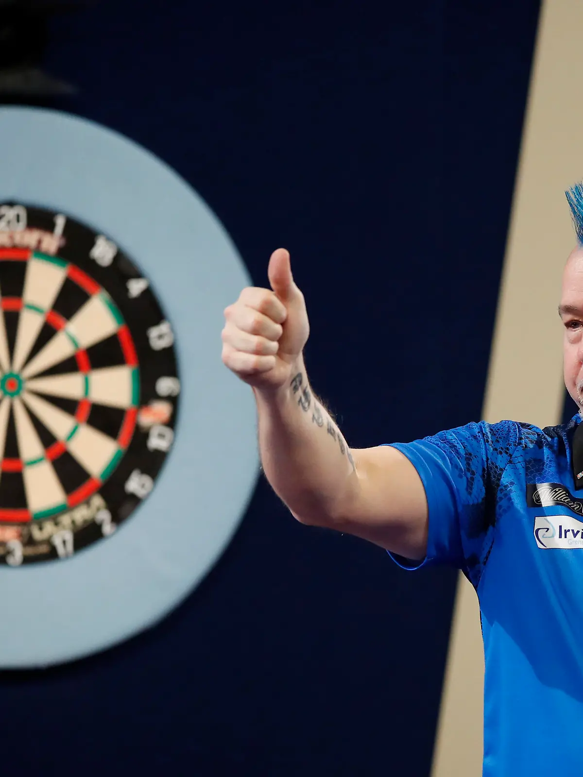 LONDON, ENGLAND - JANUARY 02: Peter Wright of Scotland reacts to the win during his Semi-Finals Match against Gary Anderson of Scotland during Day Fifteen of The William Hill World Darts Championship at Alexandra Palace on January 02, 2022 in London, England. (Photo by Luke Walker/Getty Images)