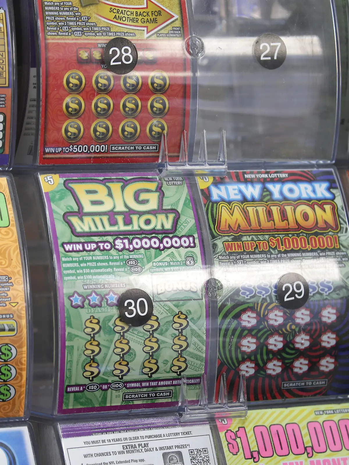 Scratch off lottery tickets are on display inside a store in New York City on Tuesday, January 12, 2021. The upcoming Mega Millions and Powerball multi-state drawings are worth a combined over 1 billion dollars and are each among the 12 largest lottery drawings in U.S. lottery history. Photo by John Angelillo/UPI Photo via Newscom picture alliance