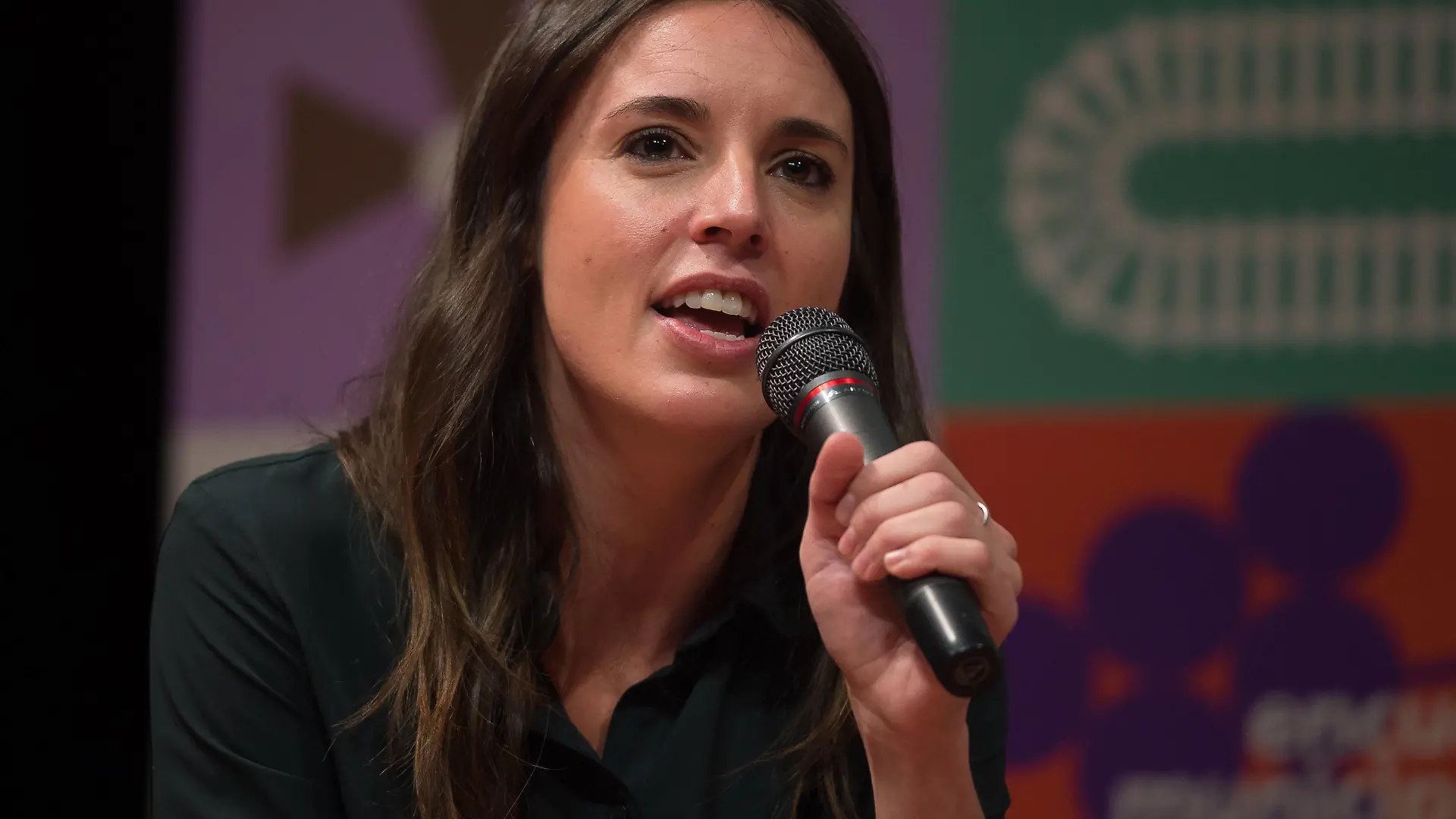 December 11, 2021, Malaga, Spain: Spanish Equality Minister, Irene Montero speaking, during a political meeting at Congress and Fair Palace..Several ministers and members from the Spanish left wing party, Podemos have participated in a meeting to address the municipal politics beside councillors and supporters party. According to the national strategy of the party, Podemos leaders want to develop municipal politics as a strategy of growth in the party. Malaga Spain - ZUMAs197 20211211_zaa_s197_022 Copyright: xJesusxMeridax