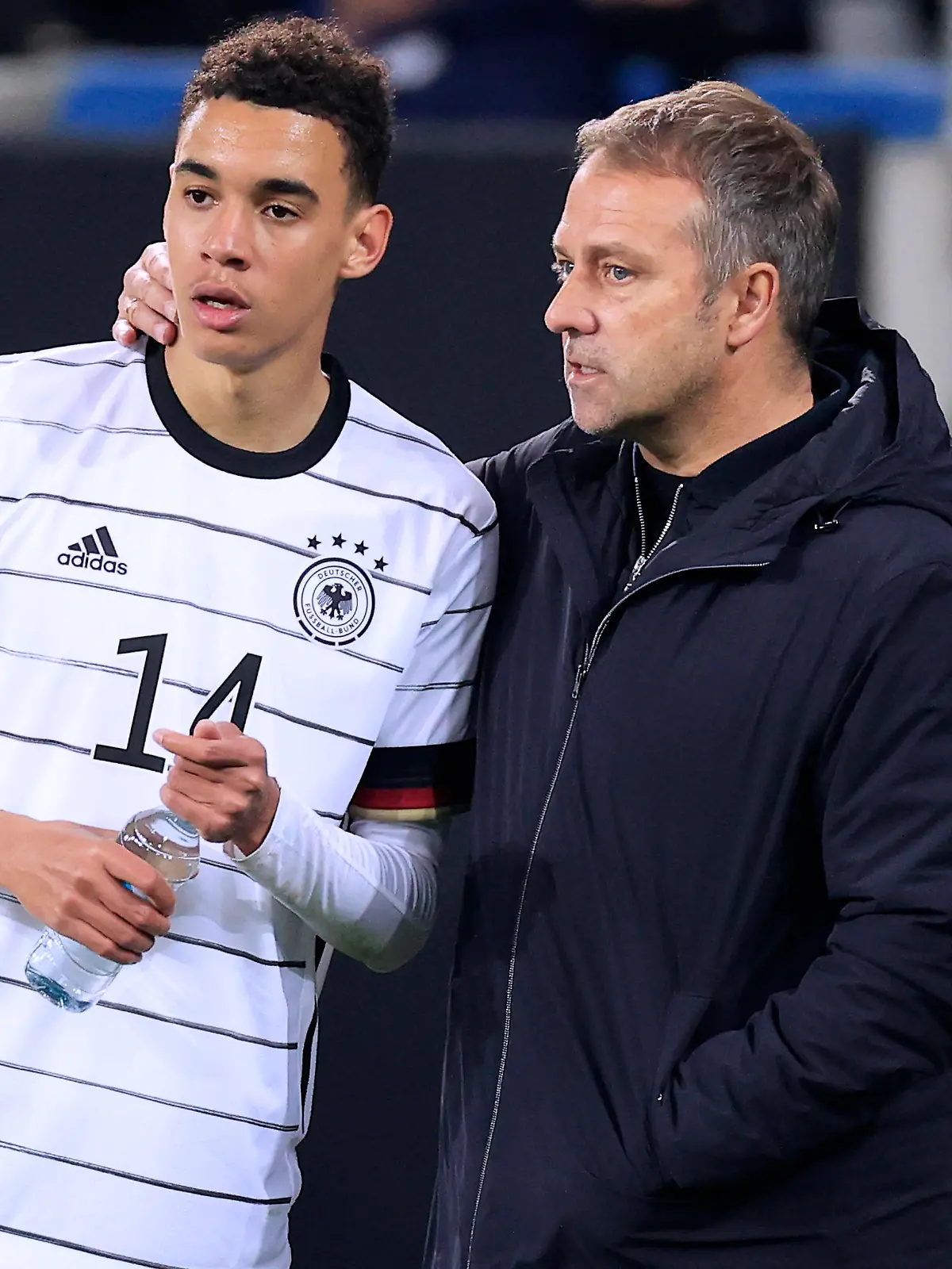 MUSIALA Jamal Team Deutschland mit Bundestrainer FLICK Hans Dieter DFB Fussball Laenderspiel Deutschland - Israel 2 : 0 am 26.03.2022 in Sinnsheim DFL REGULATIONS PROHIBIT ANY USE OF PHOTOGRAPHS as IMAGE SEQUENCES and/or QUASI-VIDEO *** MUSIALA Jamal Team Germany with national coach FLICK Hans Dieter DFB Fussball Laenderspiel Germany Israel 2 0 on 26 03 2022 in Sinnsheim DFL REGULATIONS PROHIBIT ANY USE OF PHOTOGRAPHS as IMAGE SEQUENCES and or QUASI VIDEO Copyright: xLacixPerenyix 