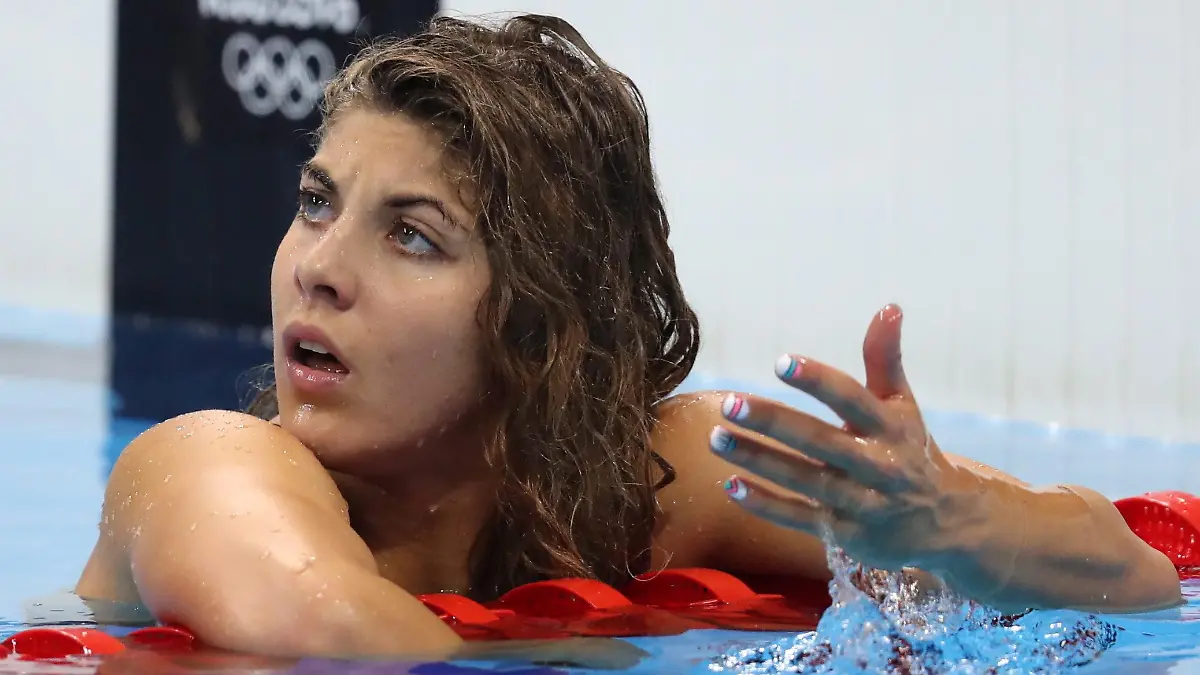epa05469564 Liliana Szilagyi of Hungary reacts after the women's 200m Butterfly Semifinal race of the Rio 2016 Olympic Games Swimming events at Olympic Aquatics Stadium at the Olympic Park in Rio de Janeiro, Brazil, 09 August 2016. EPA/ESTEBAN BIBA ++