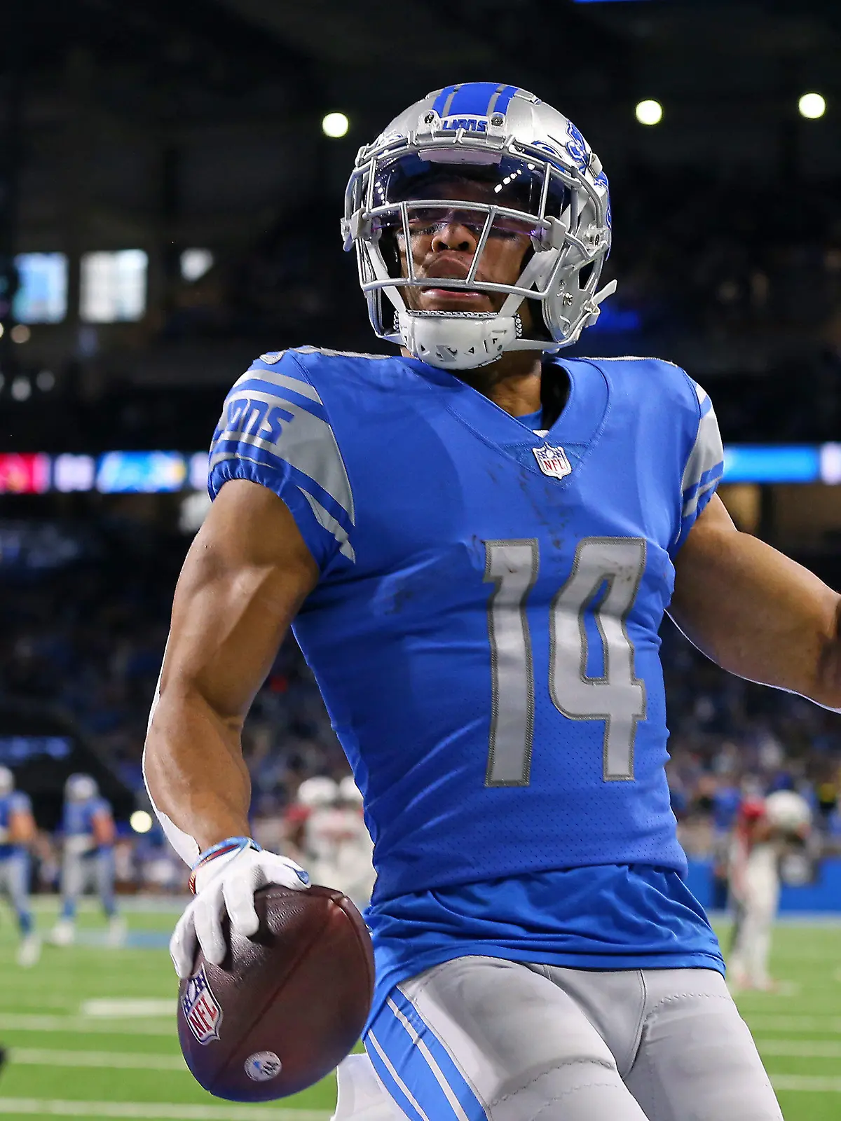 Detroit Lions wide receiver Amon-Ra St. Brown (14) scores a touchdown during the first half of an NFL football game against the Arizona Cardinals in Detroit, Michigan USA, on Sunday, December 19, 2021. (Photo by Jorge Lemus/NurPhoto)