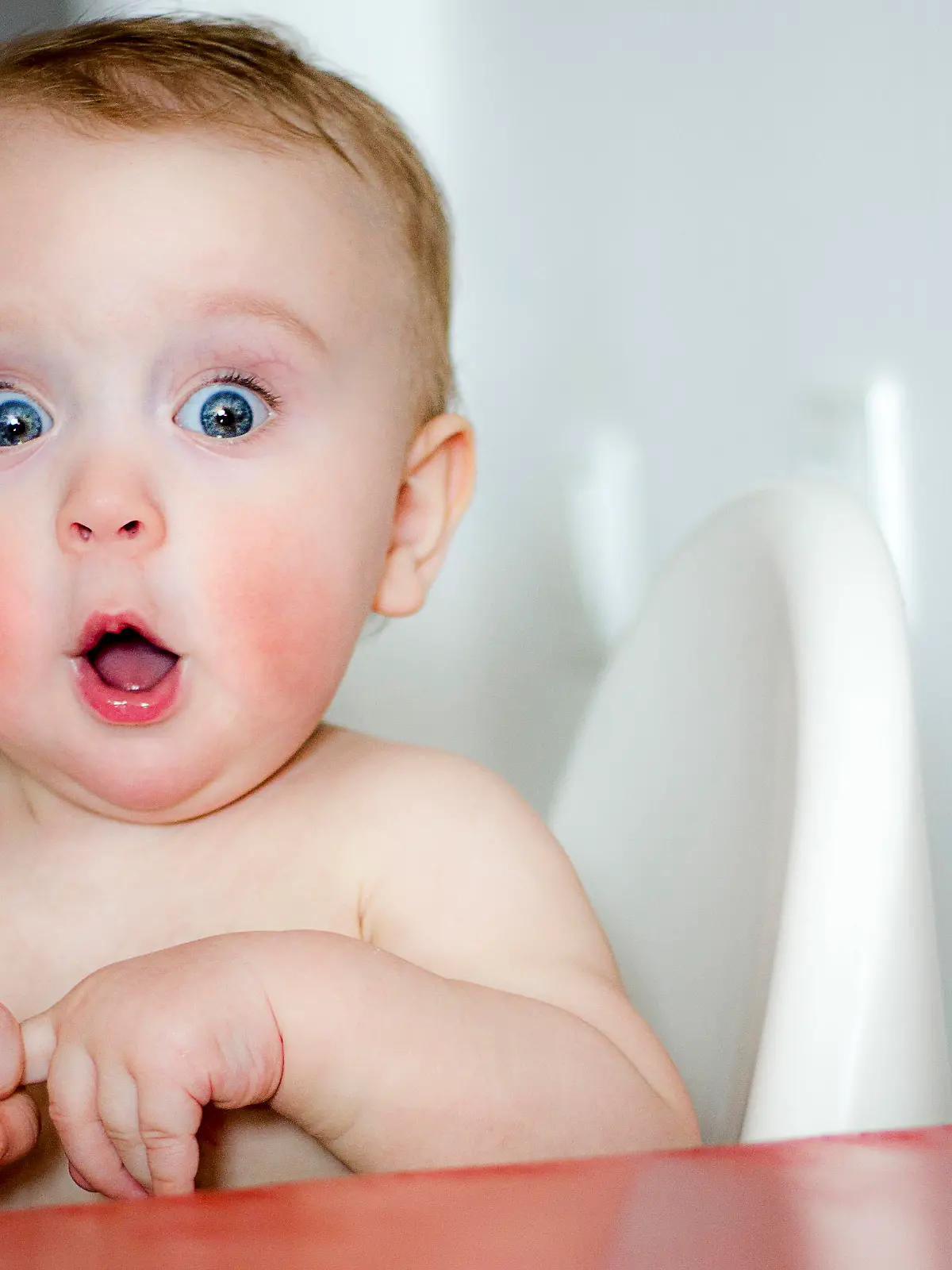child's eyes widened and mouth opened in amazement. copy space for your text
