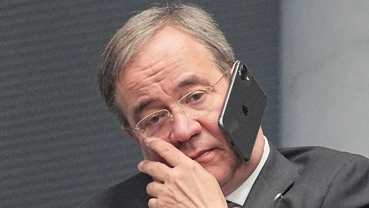 26 October 2021, Berlin: Armin Laschet, federal chairman of the CDU, talks on the phone during the constituent session of the new Bundestag. Photo by Michael Kappeler/DPA/ABACAPRESS.COM