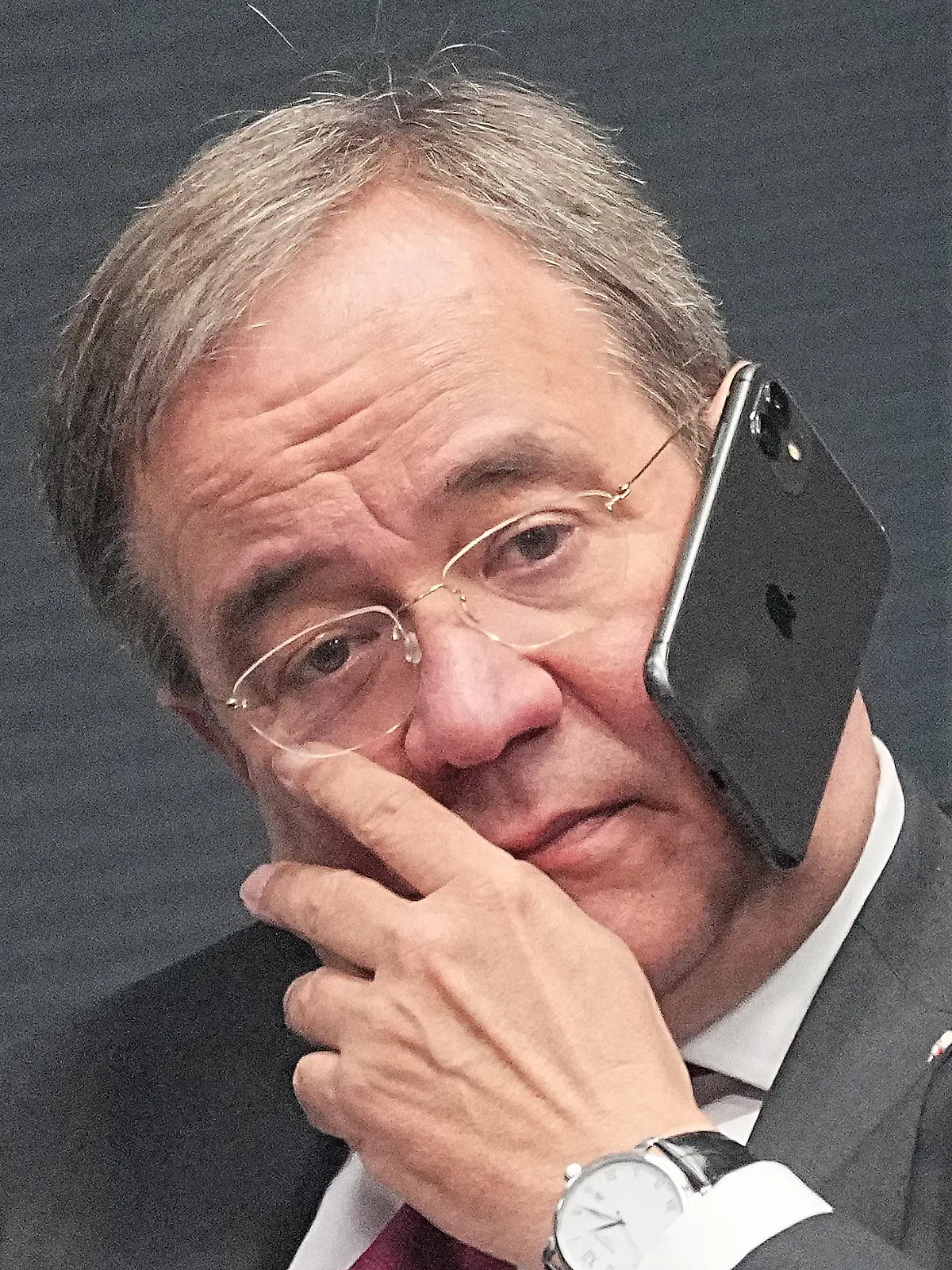 26 October 2021, Berlin: Armin Laschet, federal chairman of the CDU, talks on the phone during the constituent session of the new Bundestag. Photo by Michael Kappeler/DPA/ABACAPRESS.COM