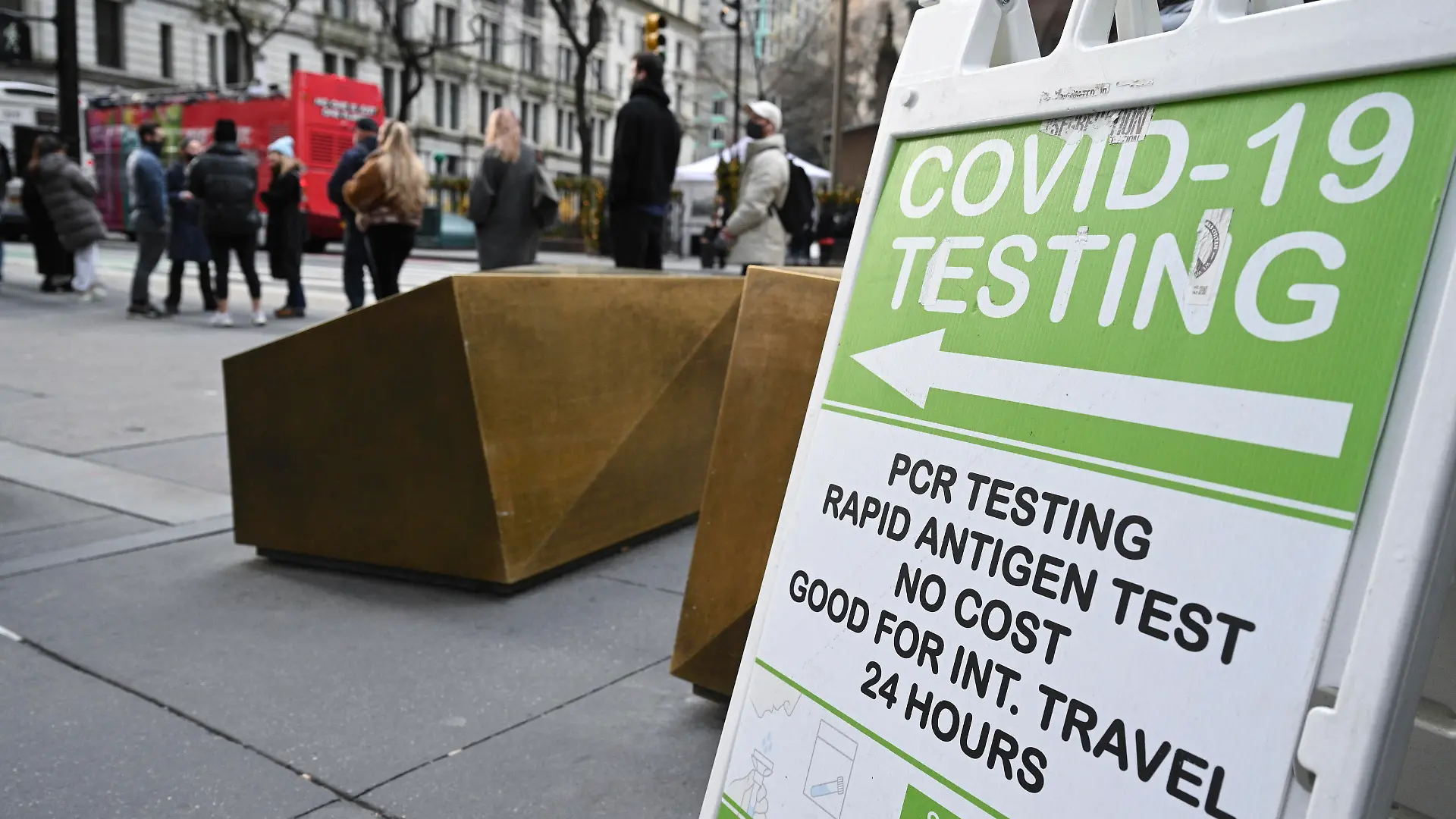 Photo by: NDZ/STAR MAX/IPx 2021 12/16/21 People wait in line to receive a COVID-19 test at a mobile COVID-19 testing site in the Financial District of Manhattan on December 8, 2021 in New York.