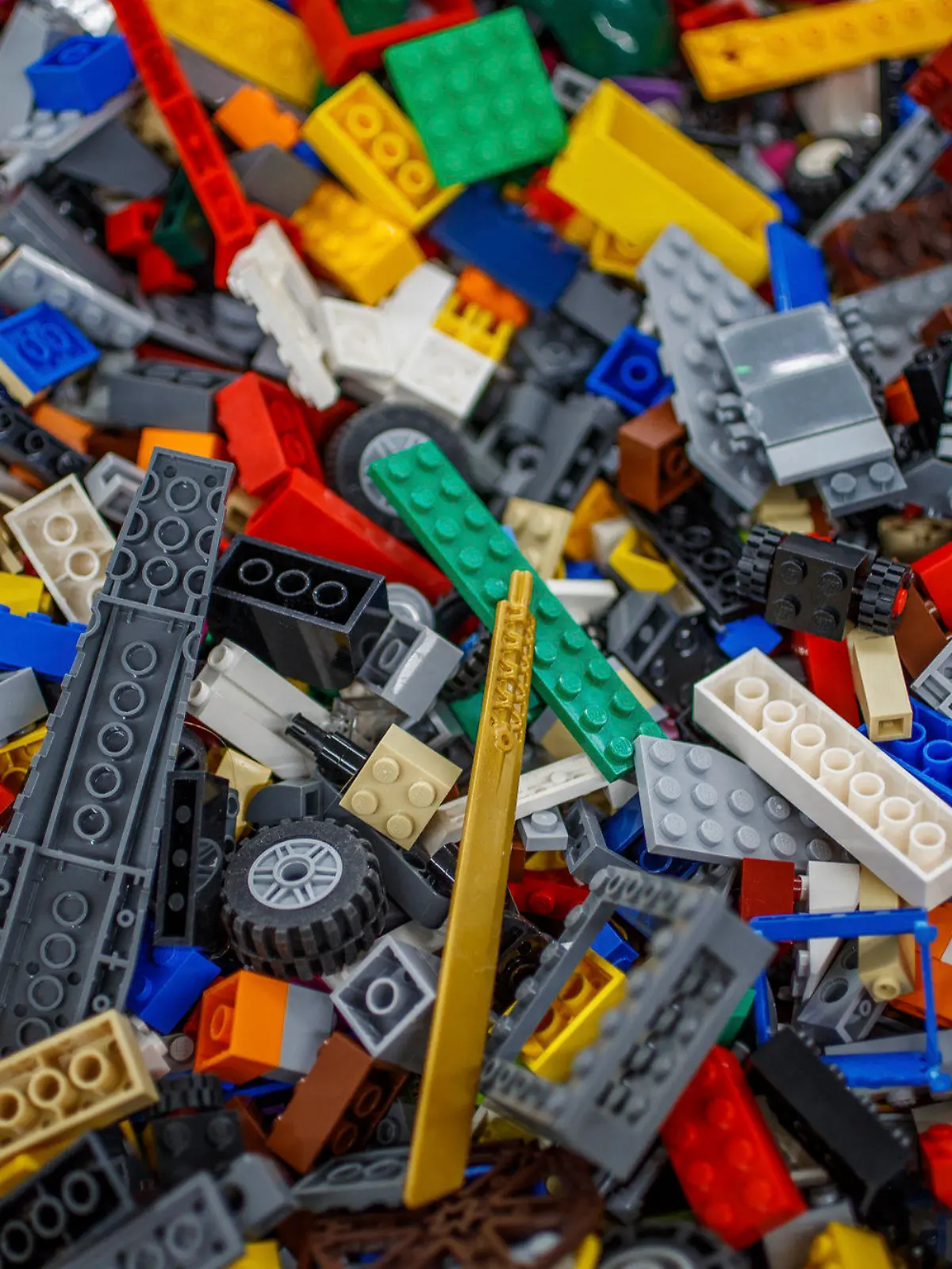 Various Lego parts, pieces and sets sit ready to sell Monday, Nov. 29, 2021, inside It's A Block Party in Indianapolis. The store is the main commercial arm of Doug Davis’ lifelong Lego collection -- some 5,000 square feet of floor-to-ceiling bricks, all of the small variety.  (Mykal McEldowney /The Indianapolis Star via AP)