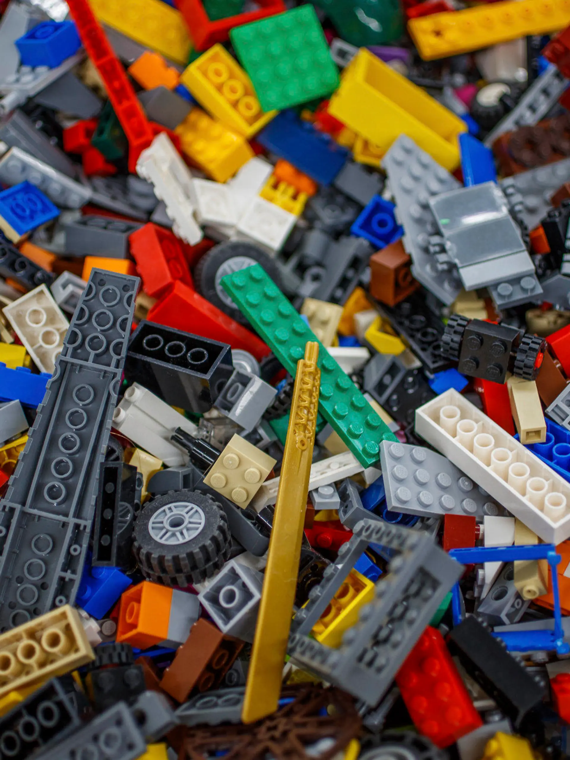 Various Lego parts, pieces and sets sit ready to sell Monday, Nov. 29, 2021, inside It's A Block Party in Indianapolis. The store is the main commercial arm of Doug Davis’ lifelong Lego collection -- some 5,000 square feet of floor-to-ceiling bricks, all of the small variety.  (Mykal McEldowney /The Indianapolis Star via AP)