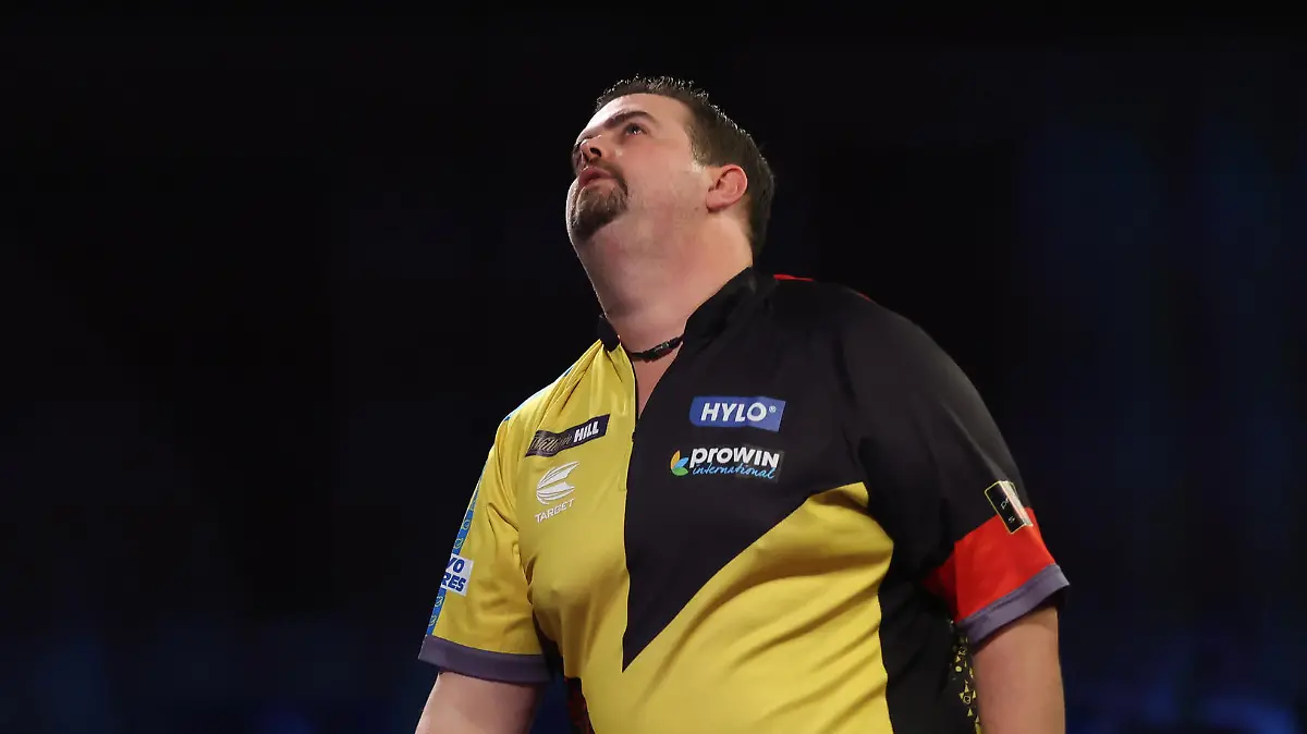 LONDON, ENGLAND - DECEMBER 27: Gabriel Clemens of Germany in action during his Third Round Match against Jonny Clayton of Wales during Day Ten of the William Hill World Darts Championship at Alexandra Palace on December 27, 2021 in London, England. (Photo by Luke Walker/Getty Images)